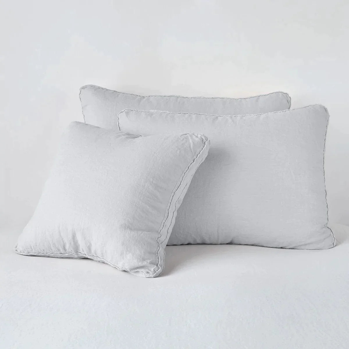 Sterling: Midweight linen shams in sterling colorway shown leaning upright on white background.