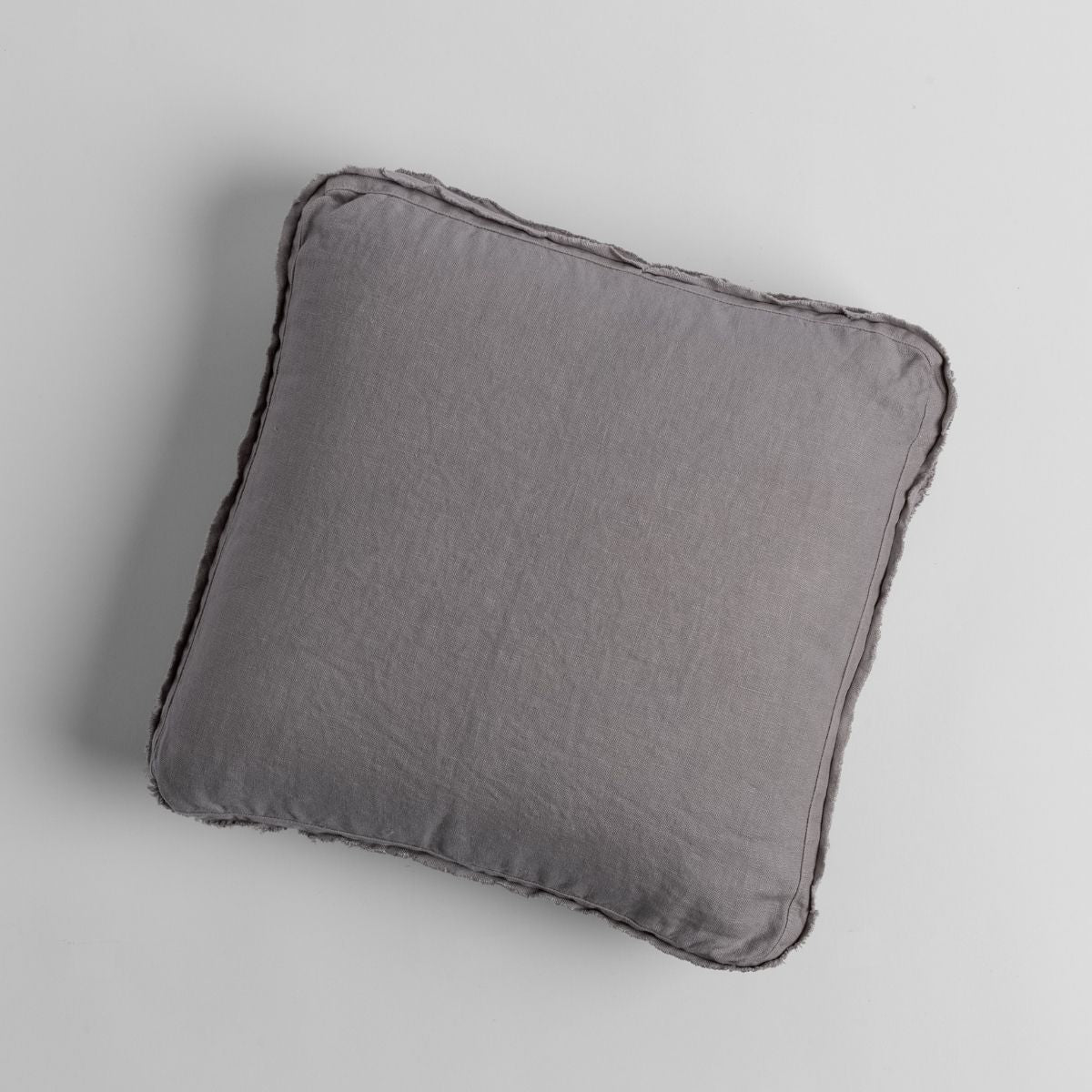 Moonlight: midweight linen 18x18 inch throw pillow shot from overhead against a white background.