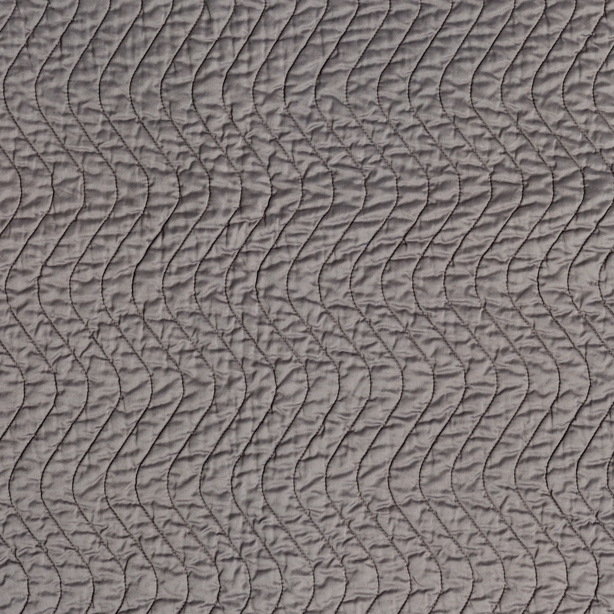 French Lavender: a close up of quilted cotton sateen fabric in french lavender, a neutral violet tone.