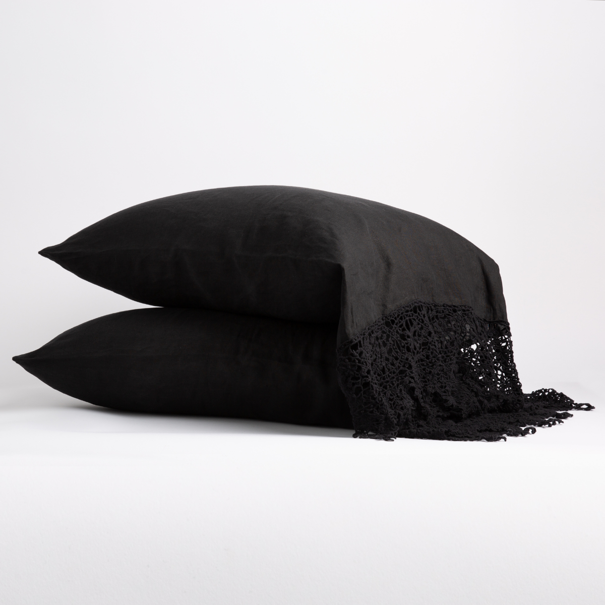 Corvino: two sleeping pillows stacked to show lace trimmed linen.