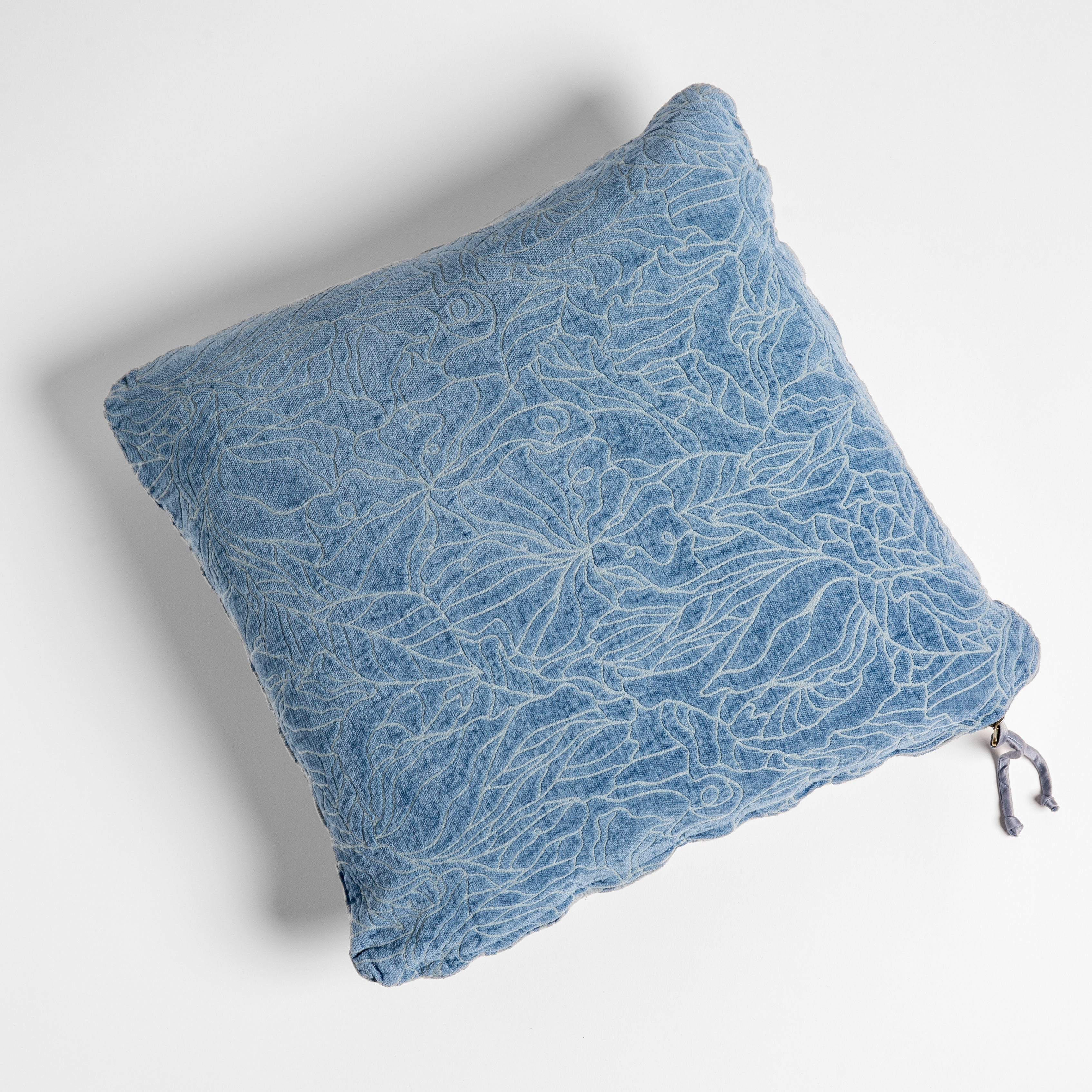 Tahoe Blue: chenille jacquard side of a georgia square cushion shown from overhead against a white background.