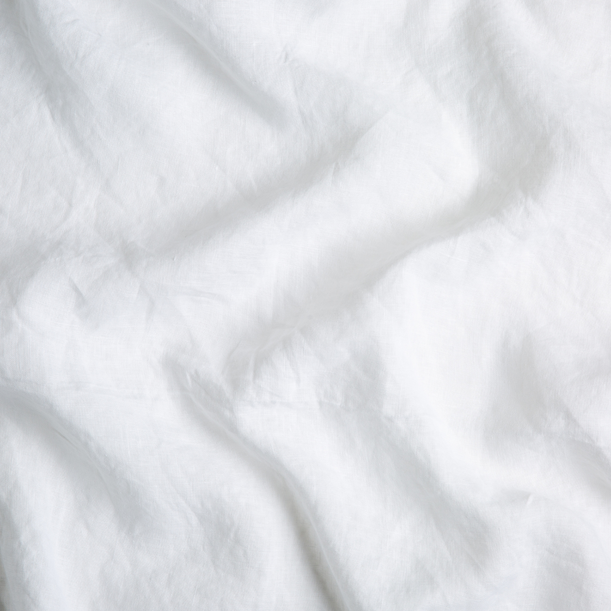 White: A close up of linen fabric in classic white.