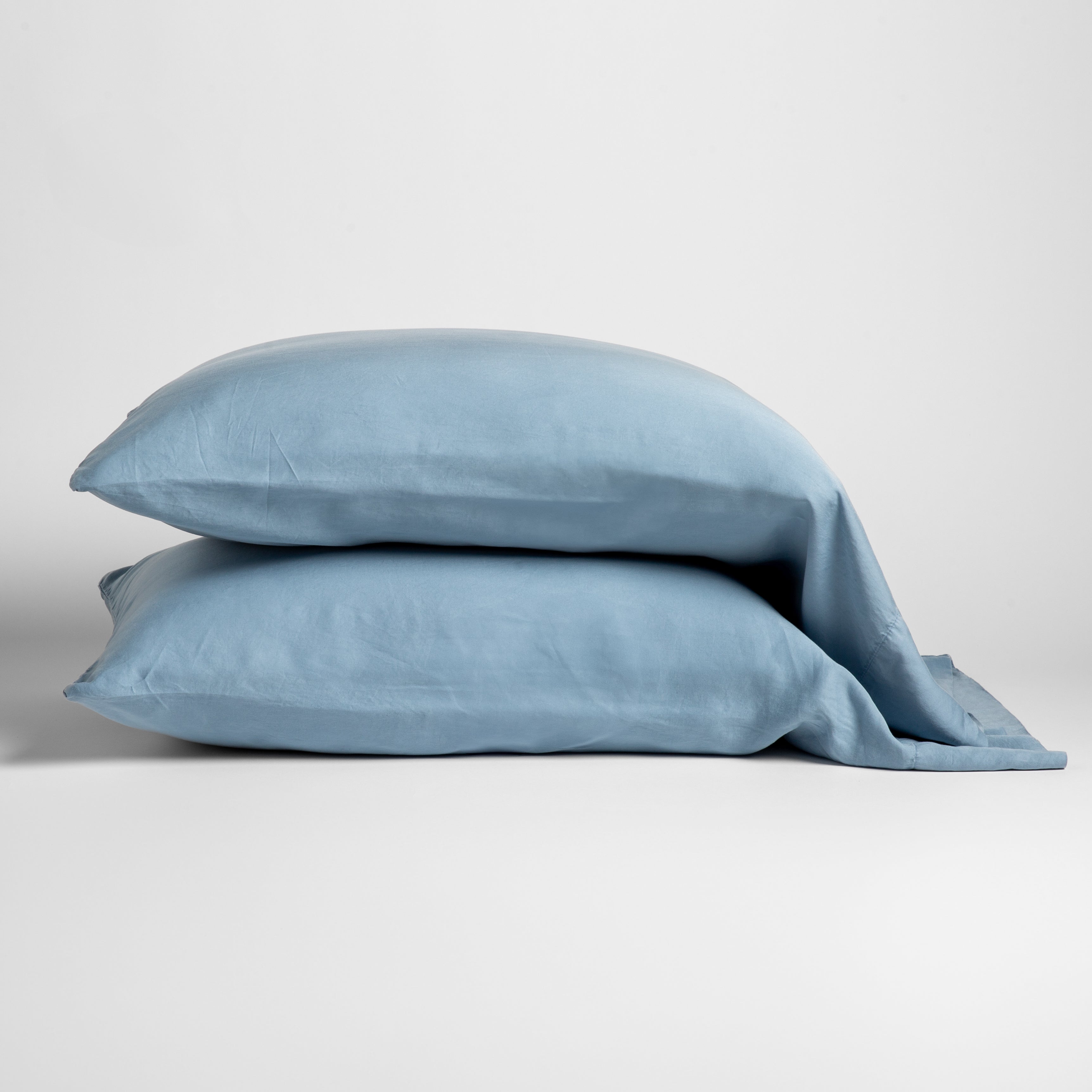 Tahoe Blue: sleeping pillows stacked neatly against a white backdrop - side view.