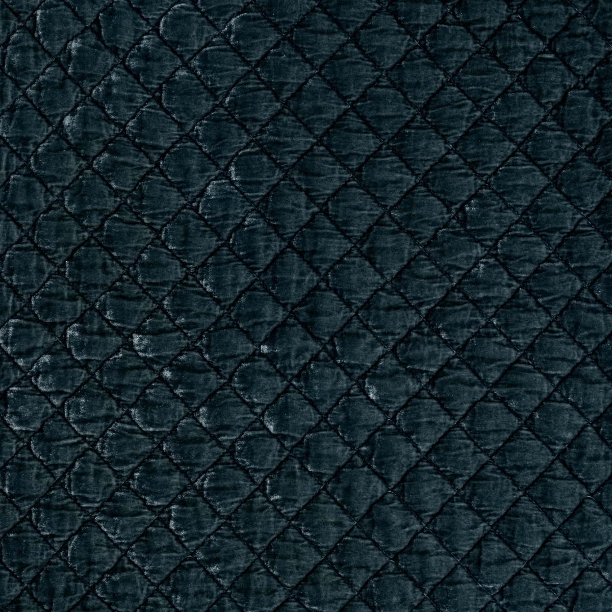 Mineral: A close up of quilted silk velvet fabric in mineral, a soothing seafoam blue with subtle grey-green undertones.