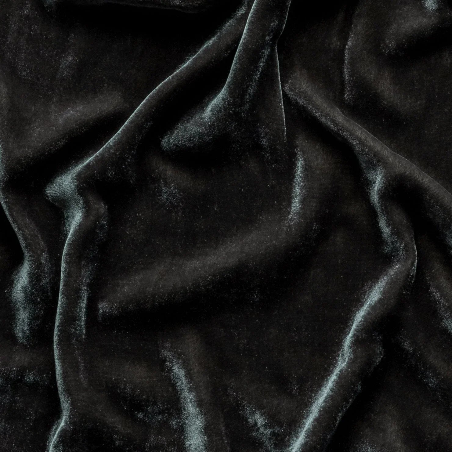 Moonlight: A close up of silk velvet in moonlight, a saturated, cool, mid-dark grey tone.