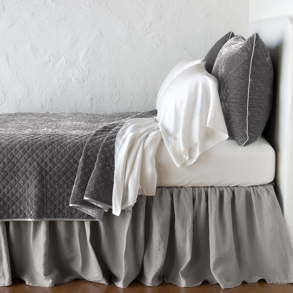 : Silk velvet quilted coverlet with matching shams and white sheeting - fog, side view.