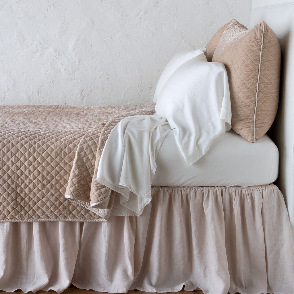 Pearl: coverlet with matching shams and white sheeting - side view.