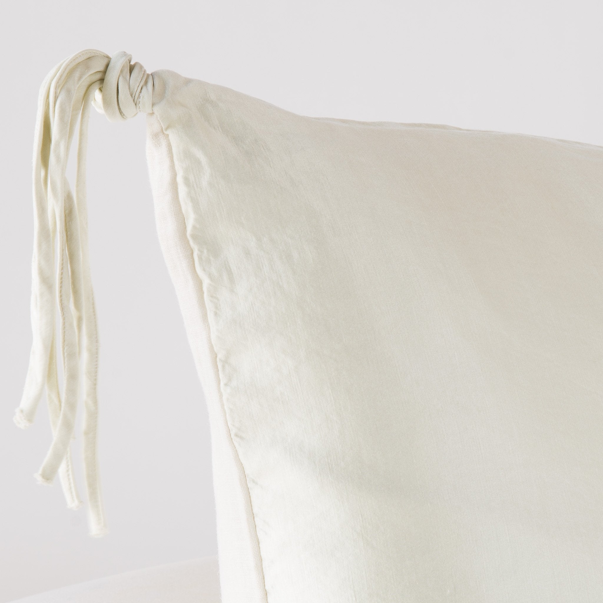 Parchment: Corner detail close-up, highlighting hand-tied charmeuse tassel.