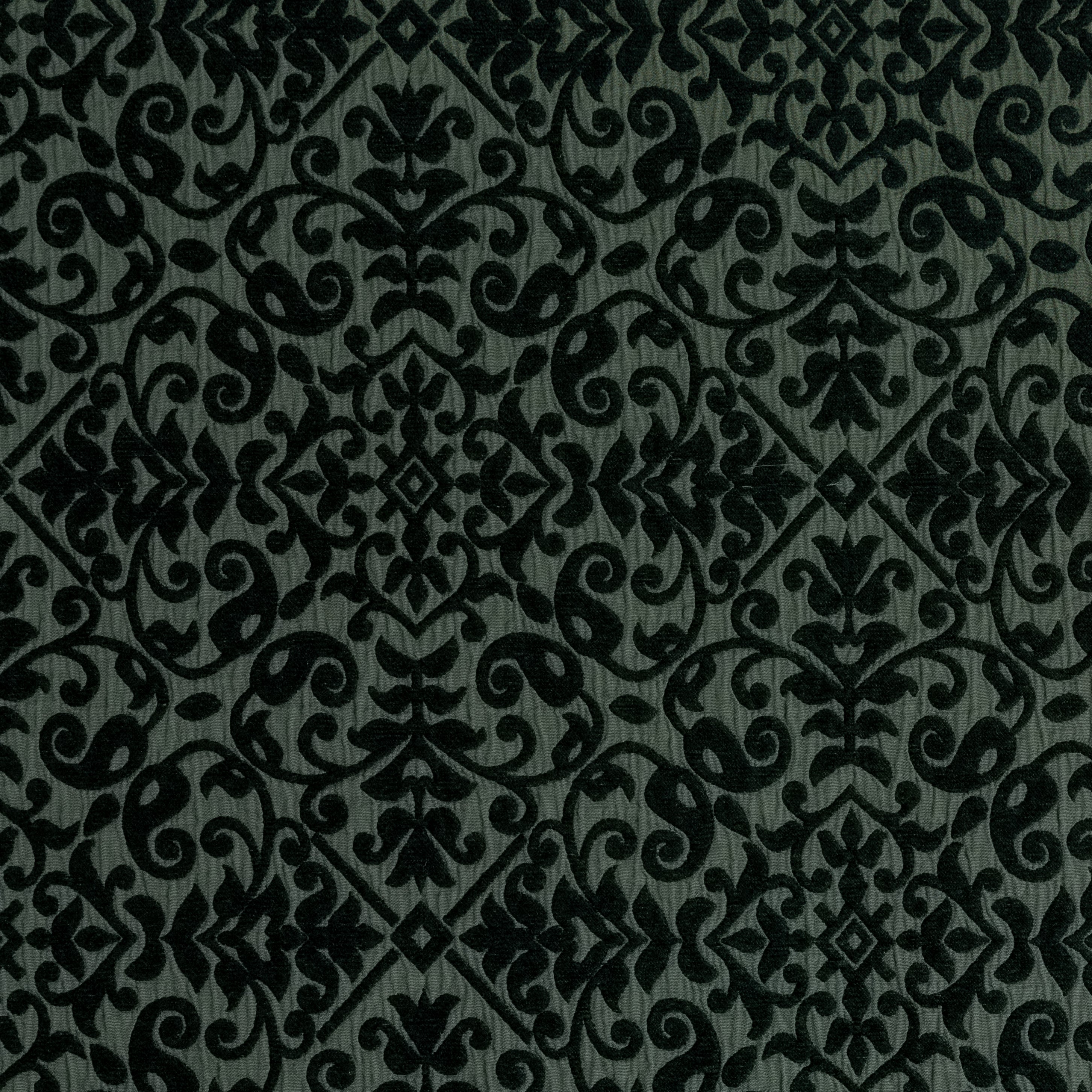 Juniper: A close up of cotton chenille fabric in Juniper, a deep green tone.
