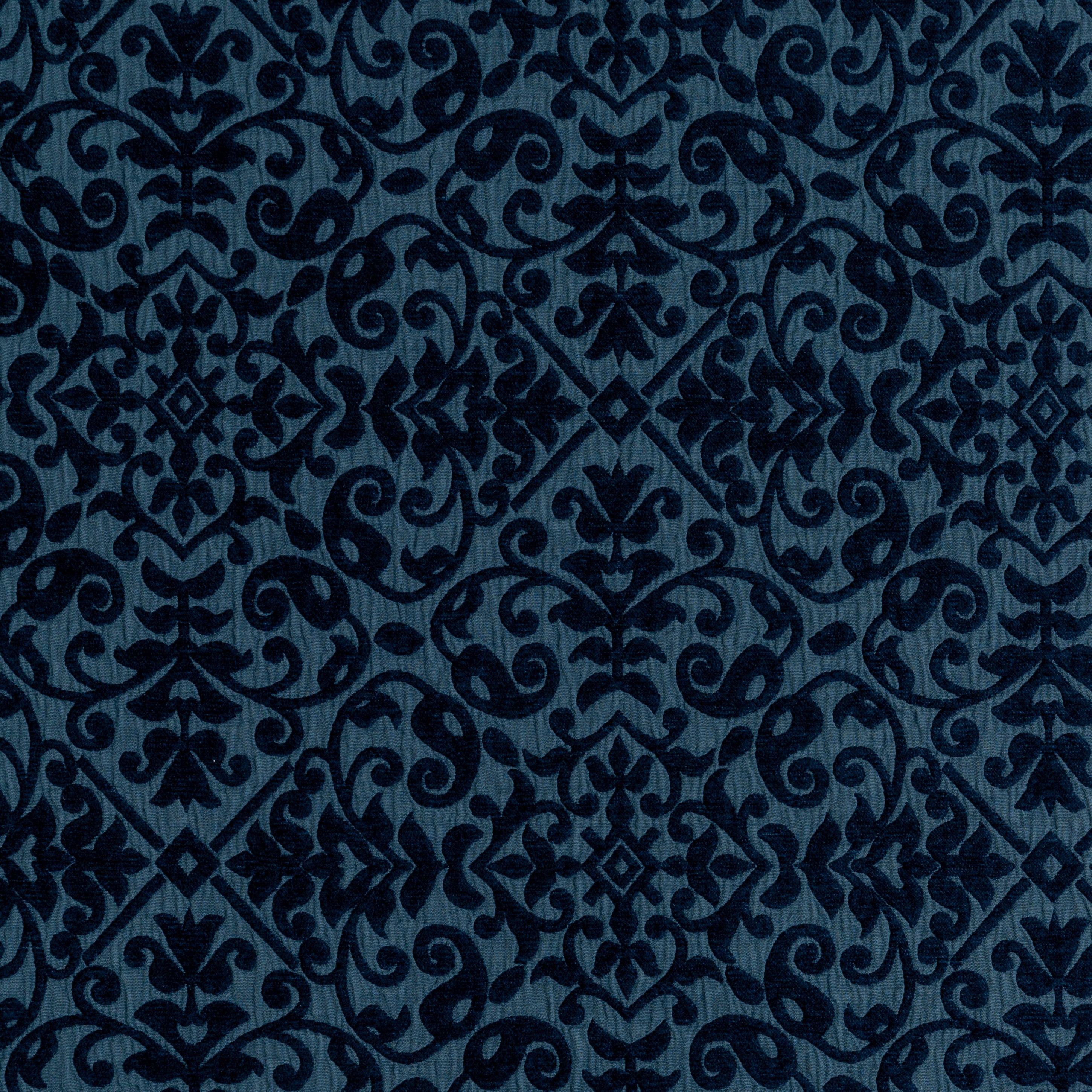 Midnight: A close up of cotton chenille fabric in midnight, a rich indigo tone.