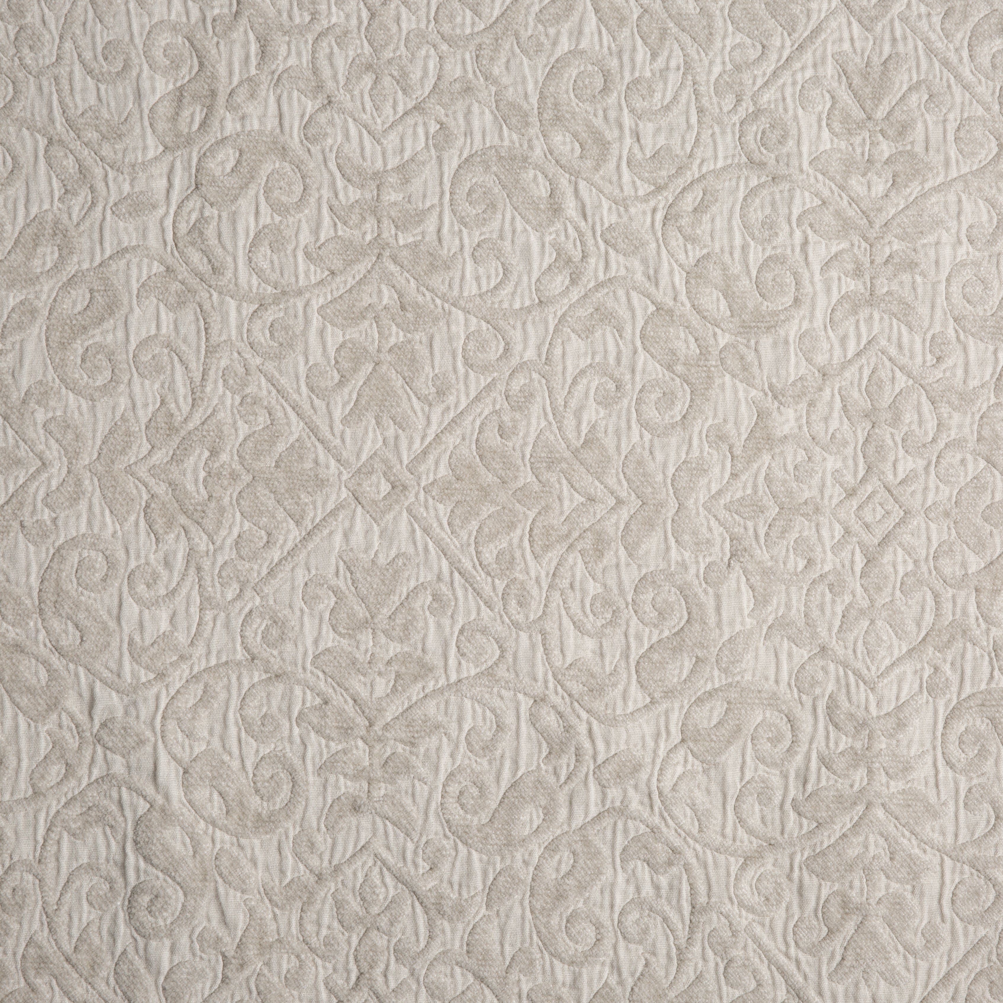 Parchment: A close up of cotton chenille fabric in parchment, a warm, antiqued cream.