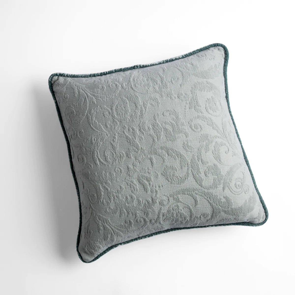 Eucalyptus: Organic cotton damask square pillow with silk velvet trim on white background β overhead angle.