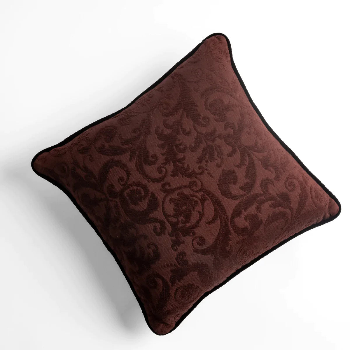 Mahogany: Organic cotton damask square pillow with silk velvet trim on white background β overhead angle.
