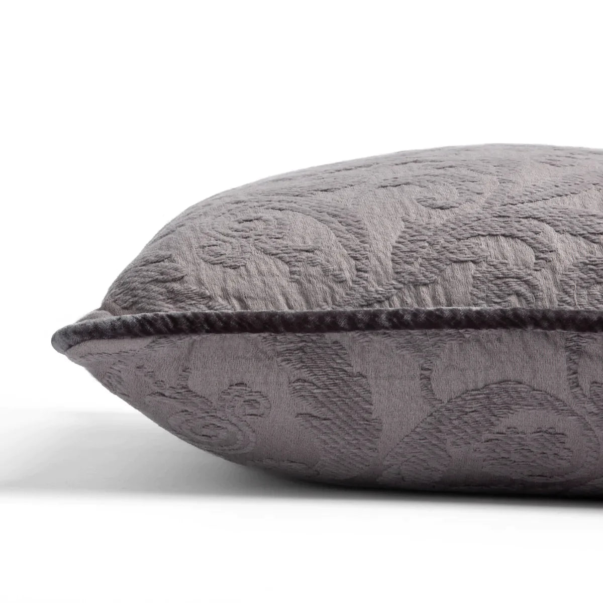 Moonlight: Organic cotton damask square pillow with silk velvet trim on white background β side angle.