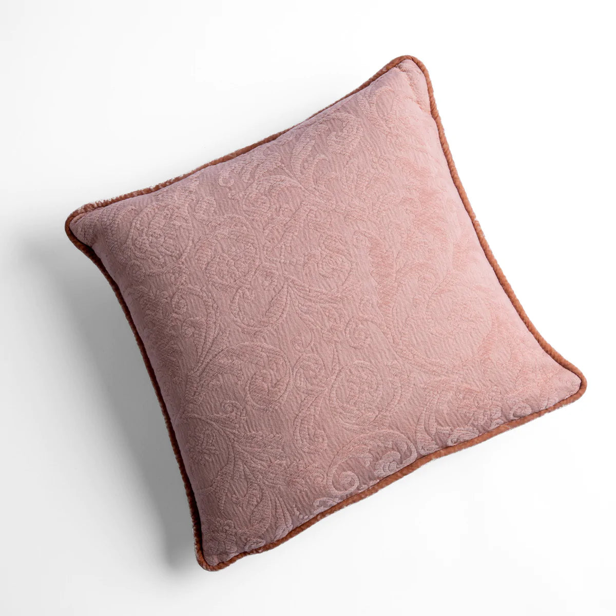 Rouge: Organic cotton damask square pillow with silk velvet trim on white background β overhead angle.