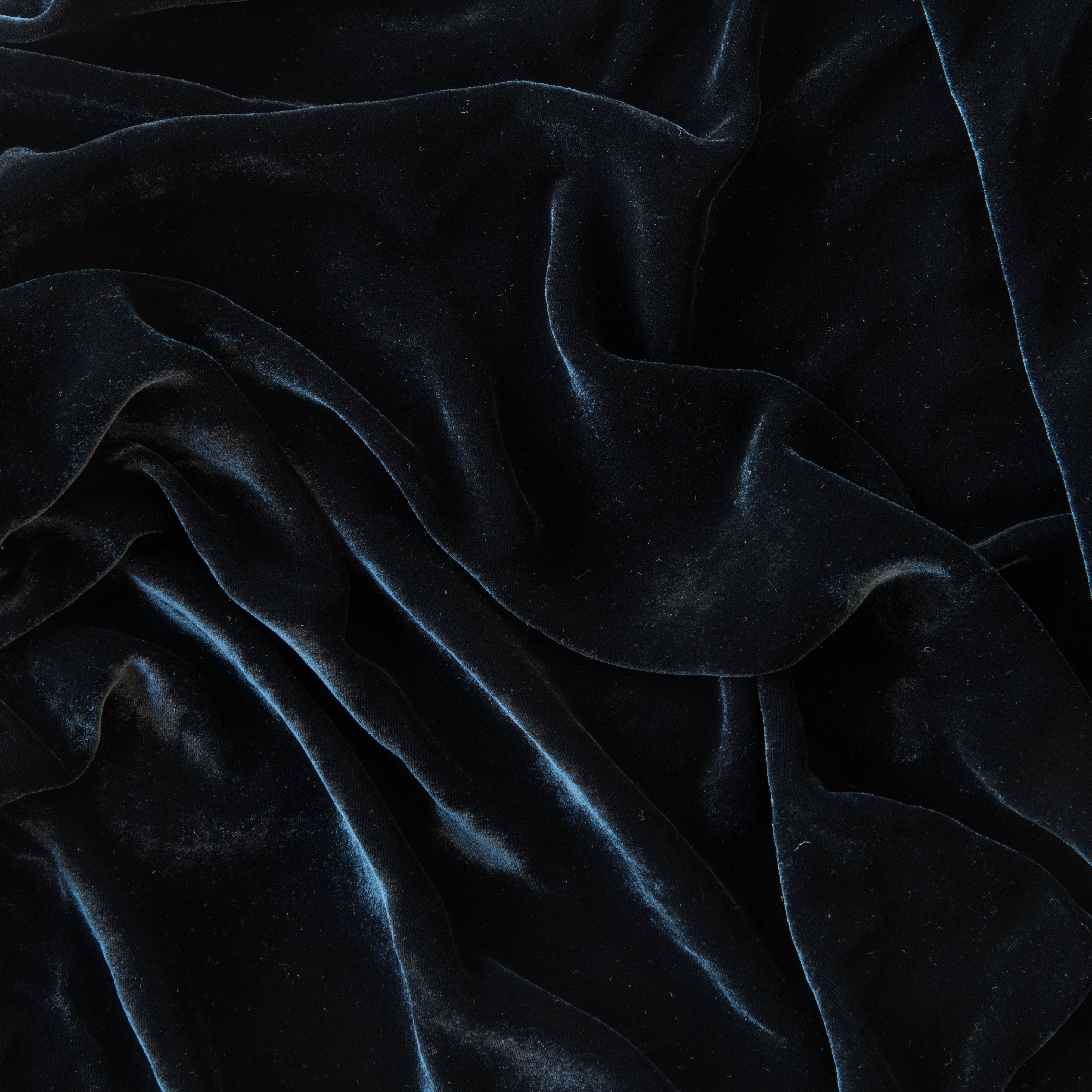 Midnight: A close up of silk velvet in midnight, a rich indigo tone.