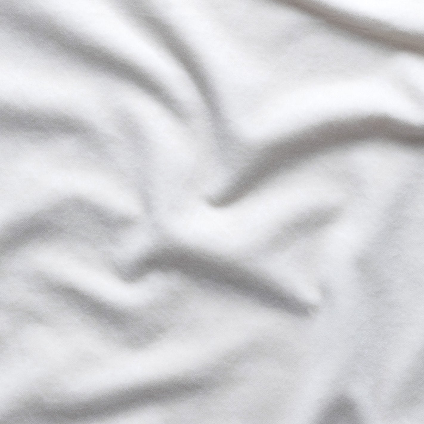 Winter White: A close up of cotton velvet in winter white, softer and warmer in tone than classic white.