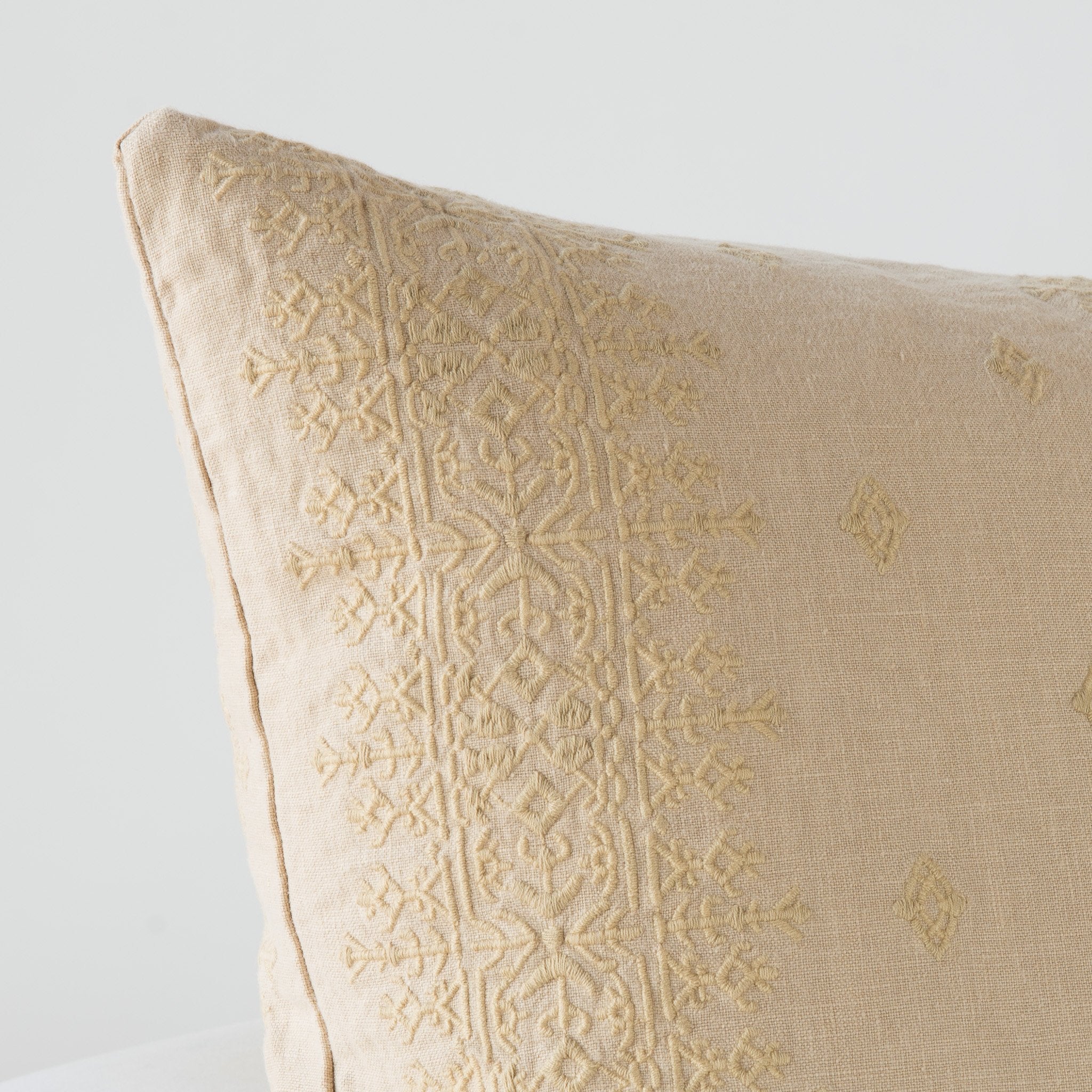 Honeycomb: Close-up of pillow corner, showcasing the embroidery pattern detail.
