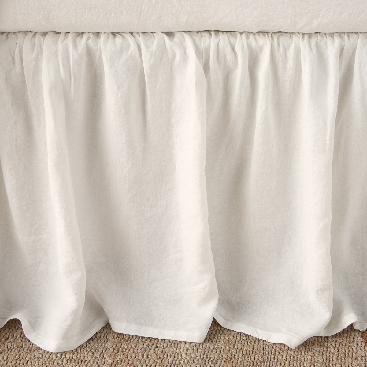 Parchment: Close-up of bed skirt, featuring its softly gathered design.