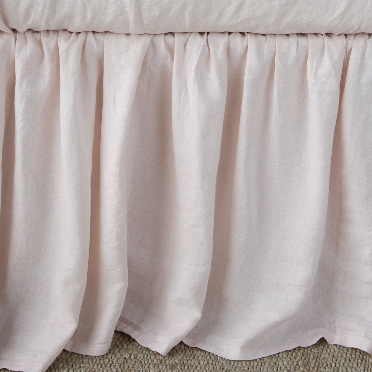 Pearl: Close-up of bed skirt, featuring its softly gathered design.