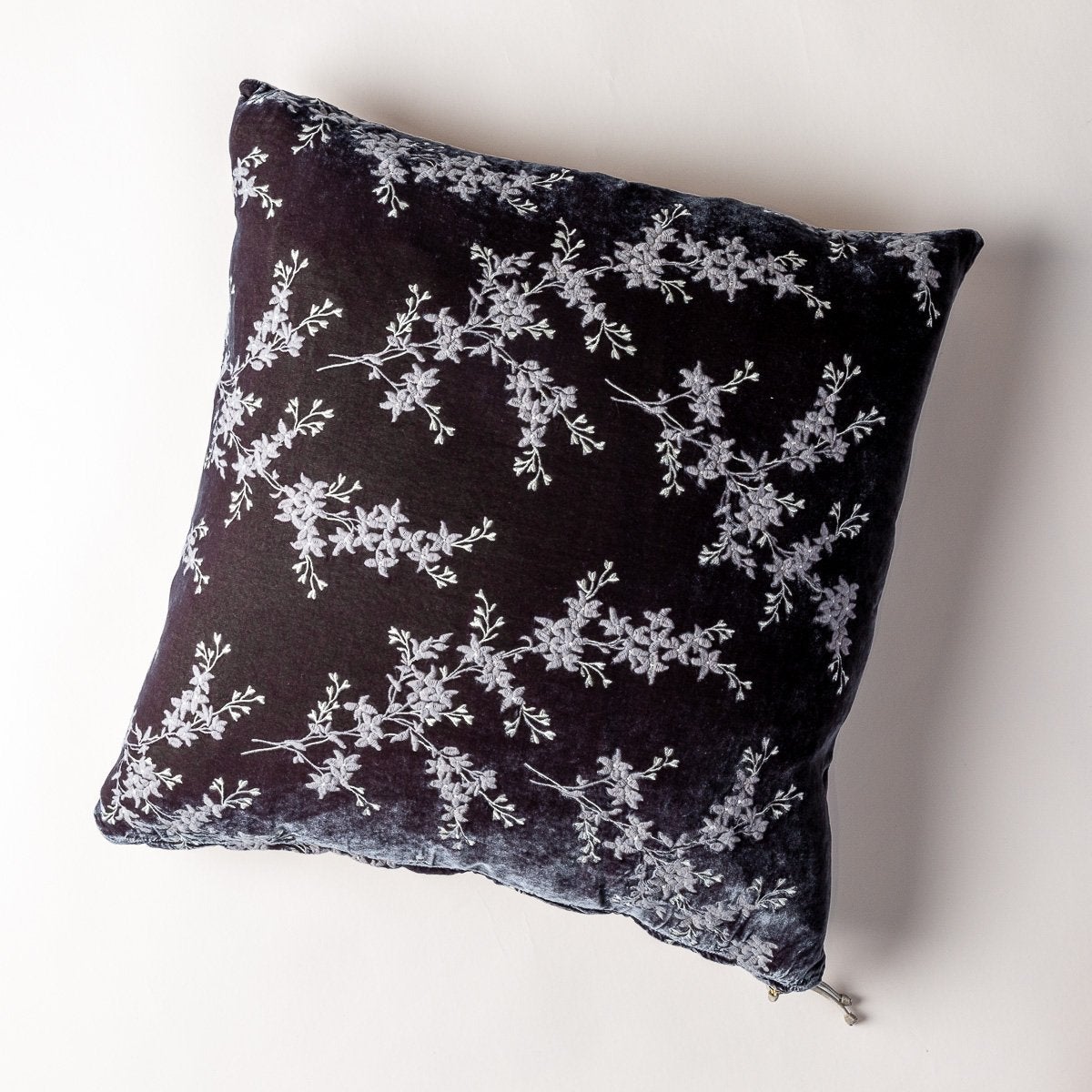 Moonlight: pillow against a plain background - overhead view.