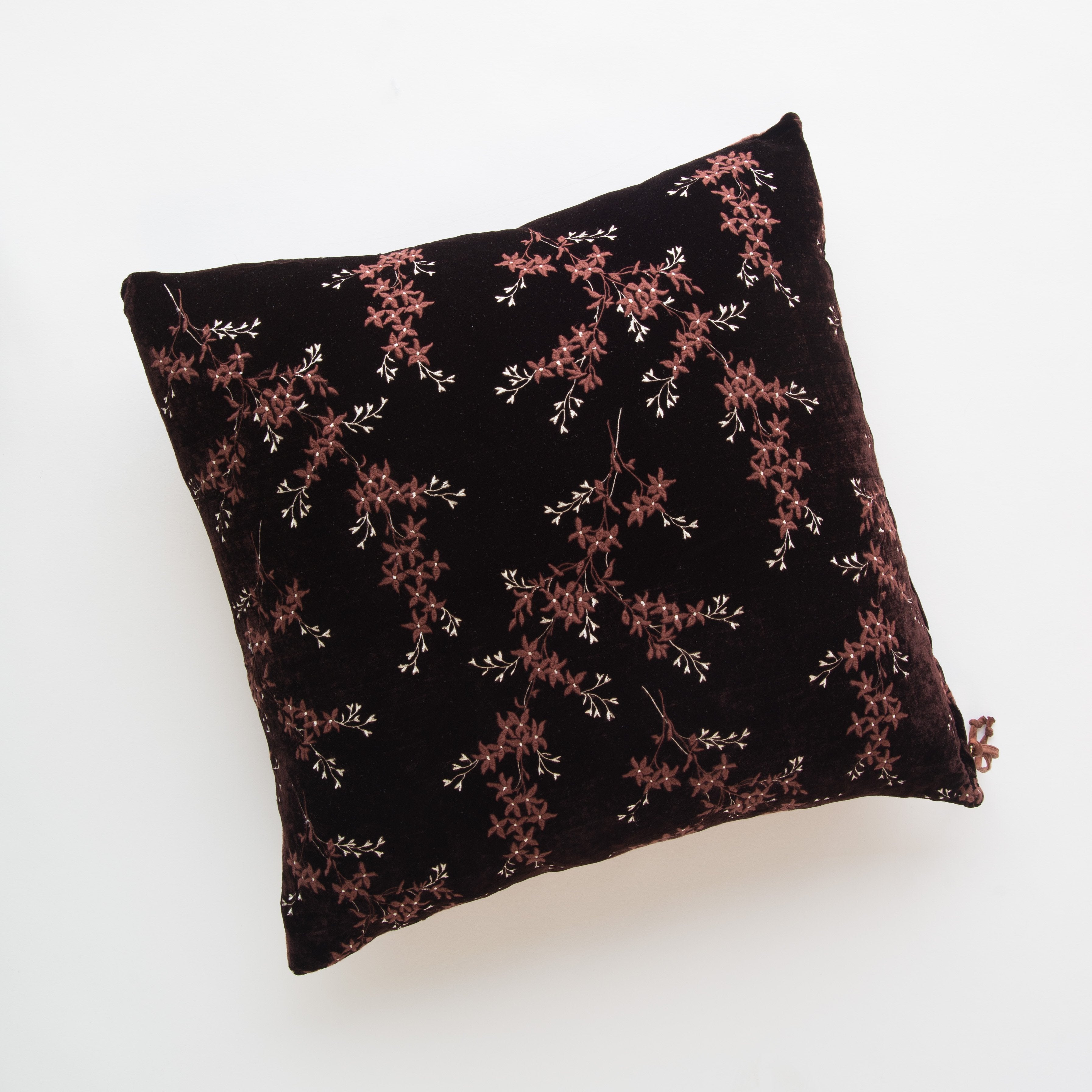 Mahogany: pillow against a plain background - overhead view.