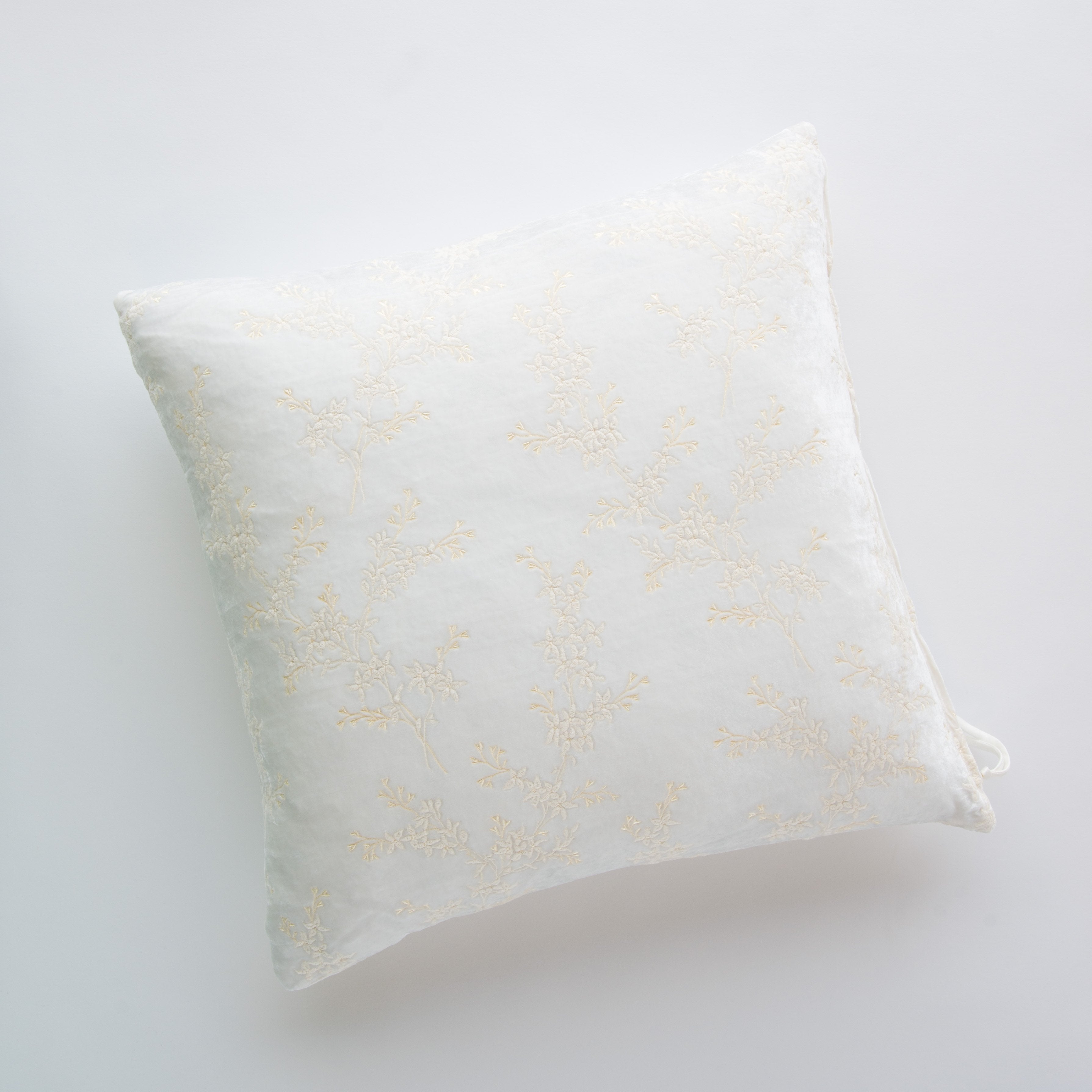 Winter White: pillow against a plain background - overhead view.