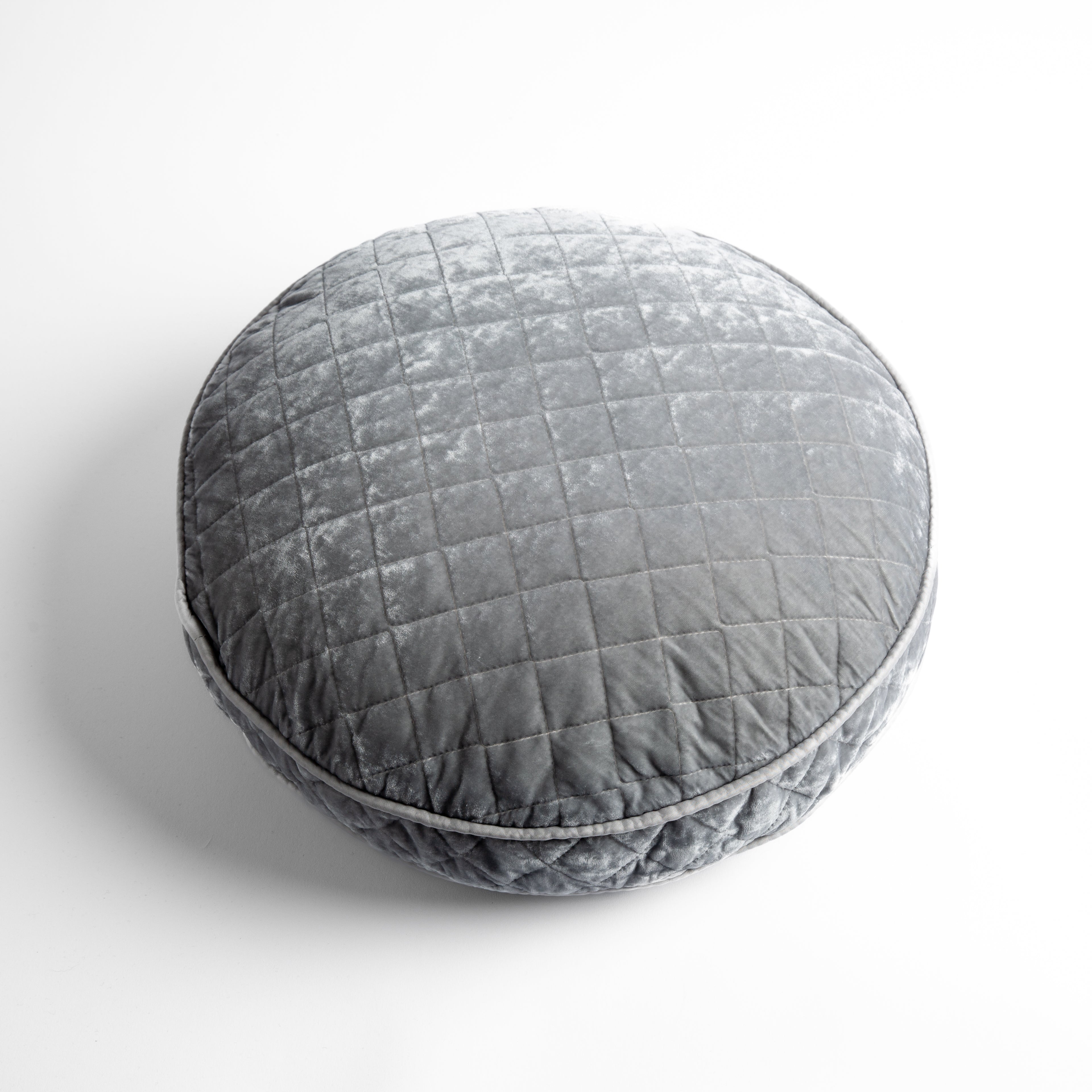 Sterling: overhead at a slight angle against a white background, the face and gusset of the pillow are visible.