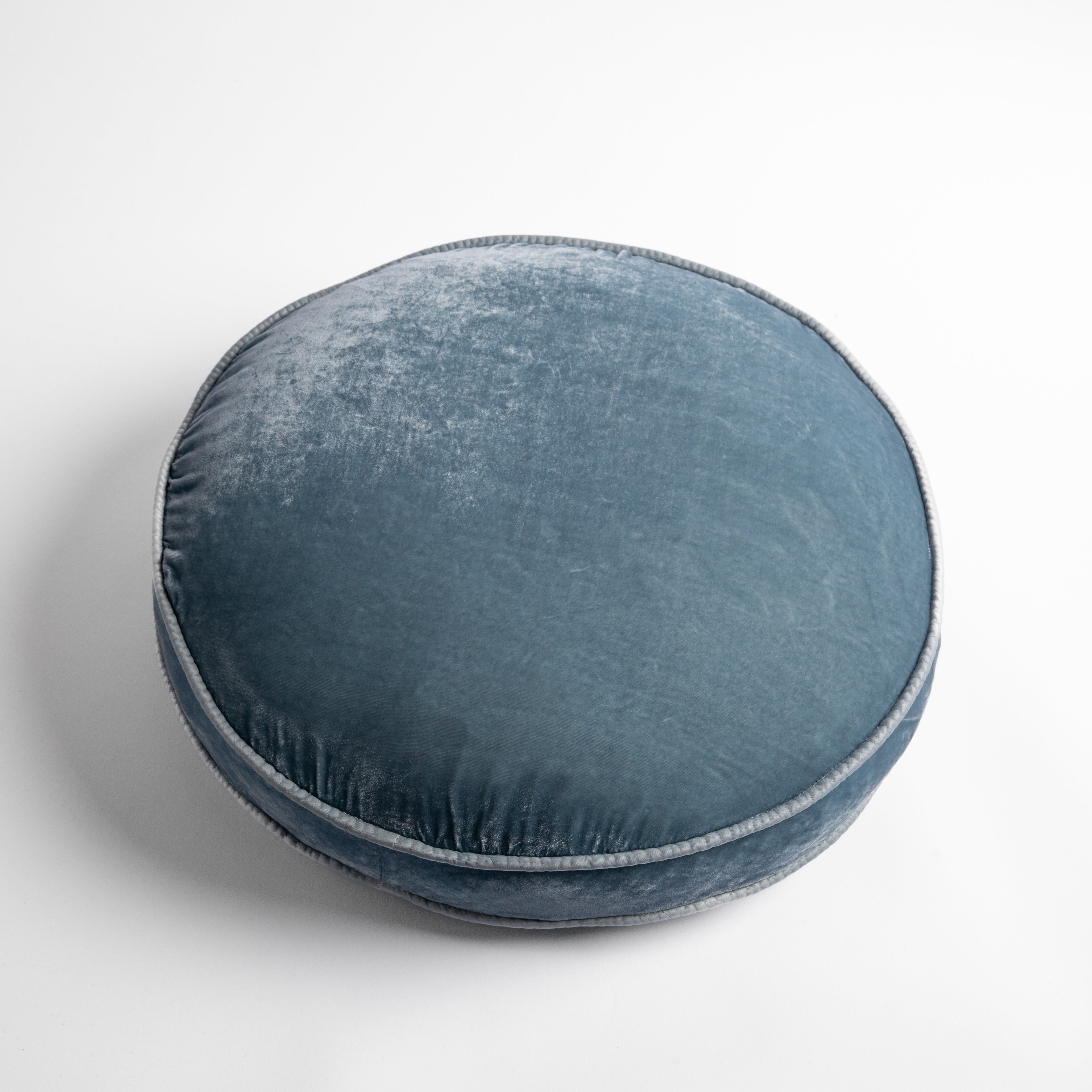 Cloud: Silk velvet round pillow with satin trim, overhead angle shows gusset.