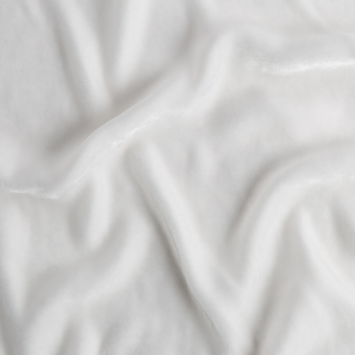 Winter White: A close up of silk velvet in winter white, softer and warmer in tone than classic white.