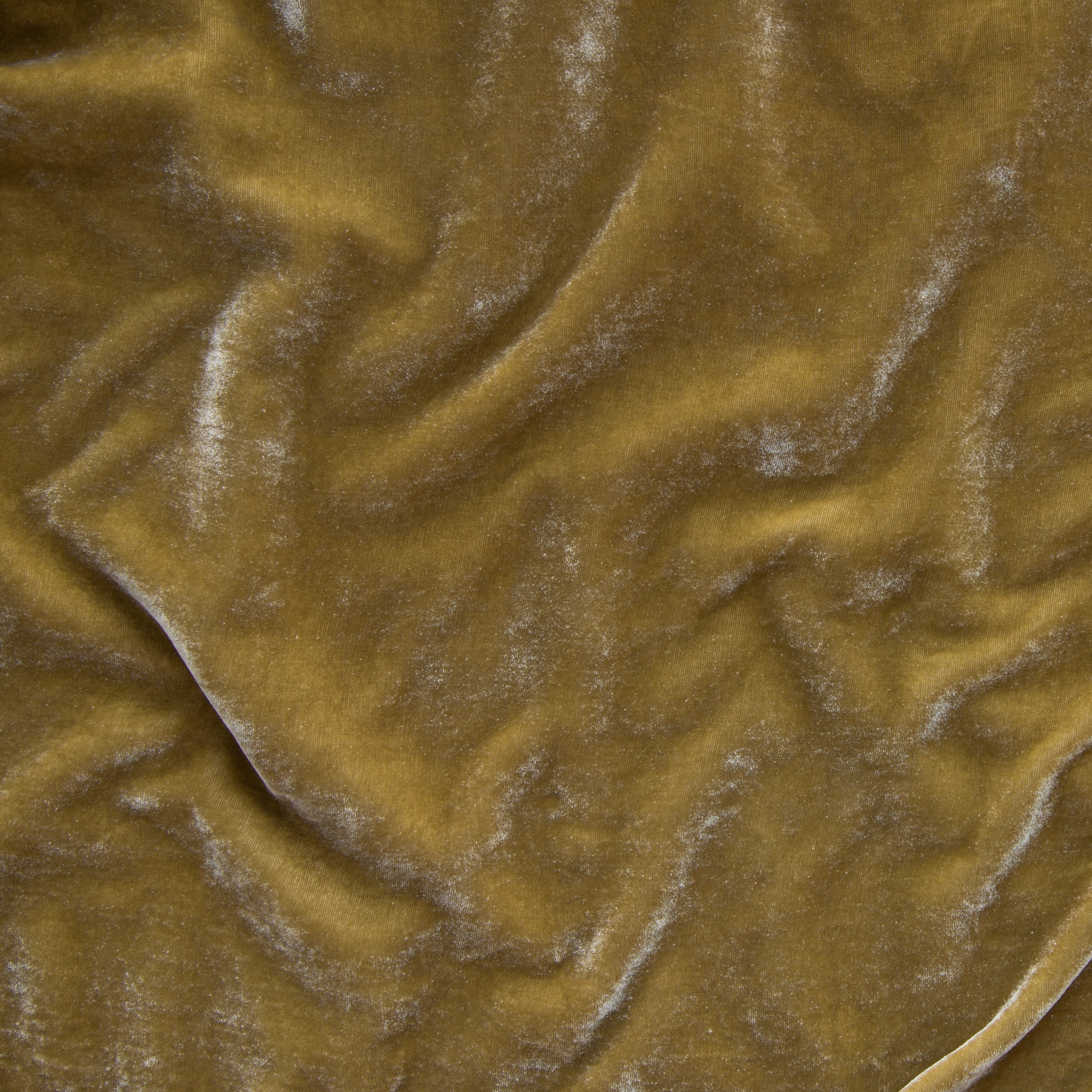 Honeycomb: A close up of silk velvet in honeycomb, a rich, warm, golden tone.