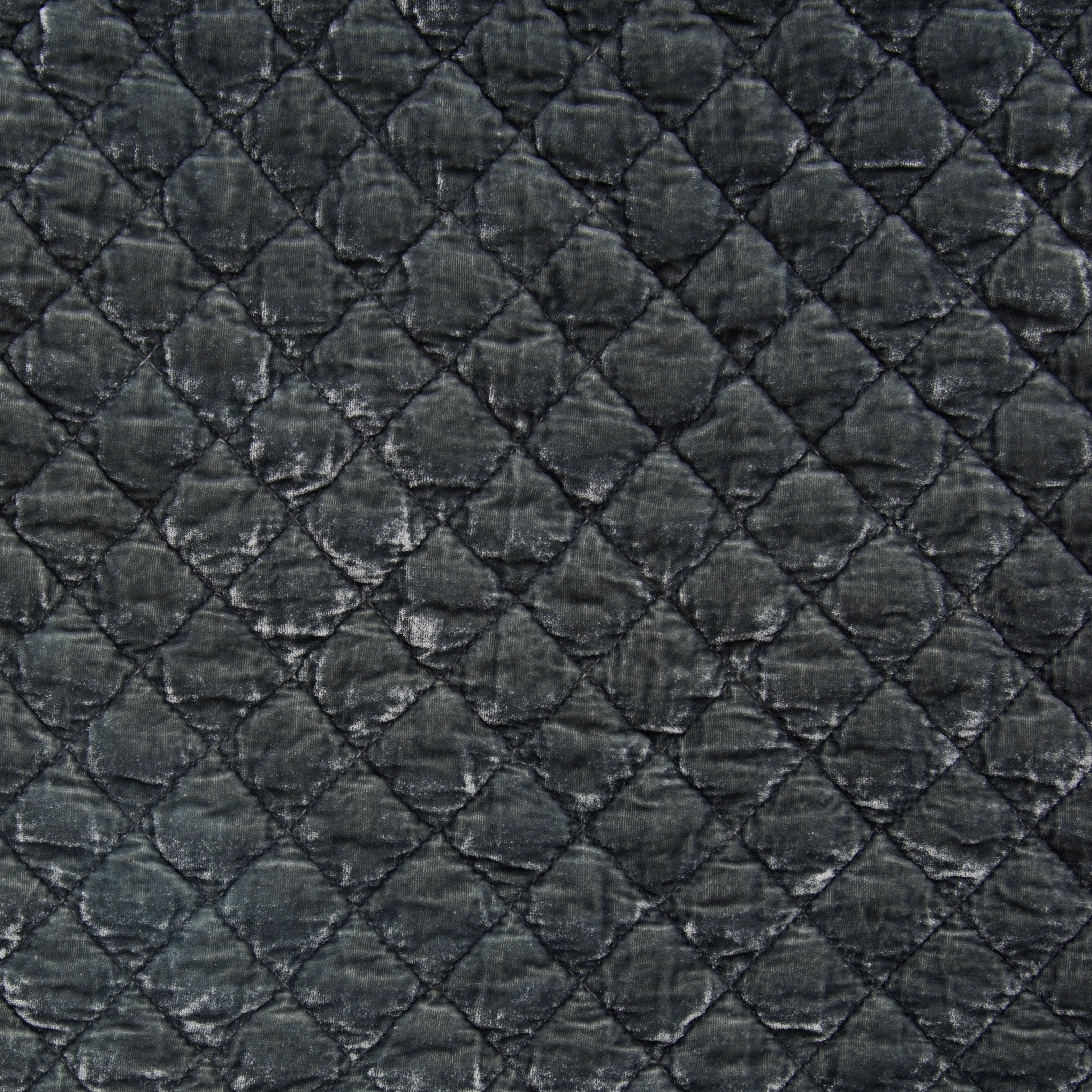 Fog: Close-up of quilted silk velvet in fog, a neutral-warm, soft mid-tone grey.