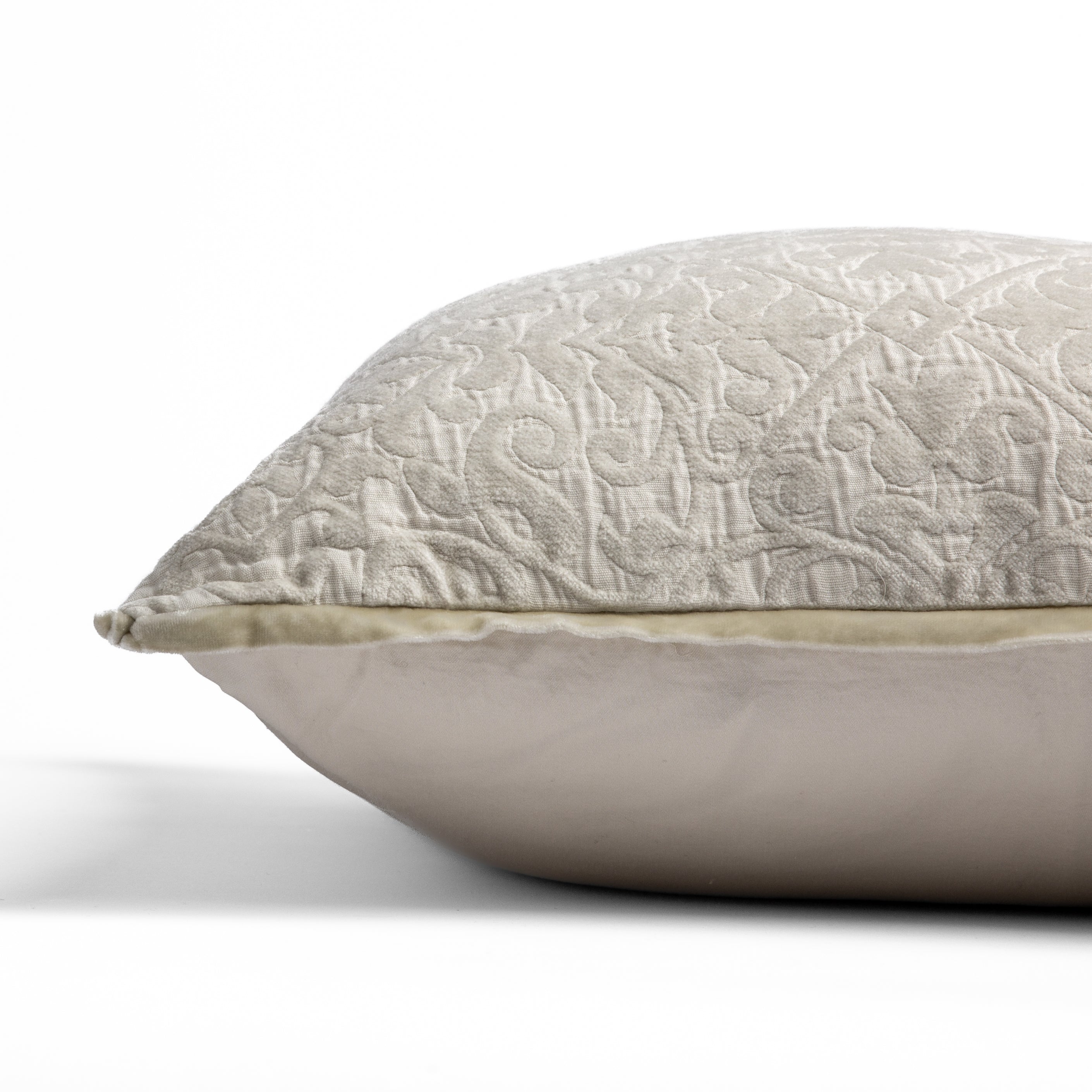 Parchment: side view of 18x18 pillow shows cotton sateen back and silk velvet trim detail β close up against a white background.