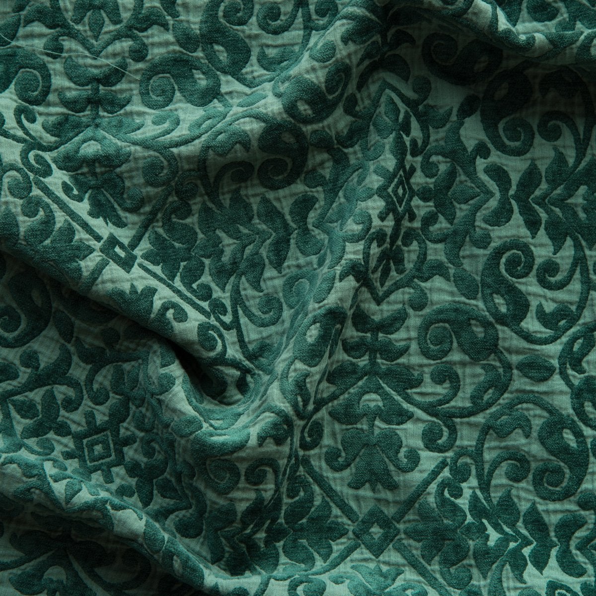 Jade: A close up of Vienna cotton chenille jacquard in jade, a rich, verdant green with subtle blue undertones.