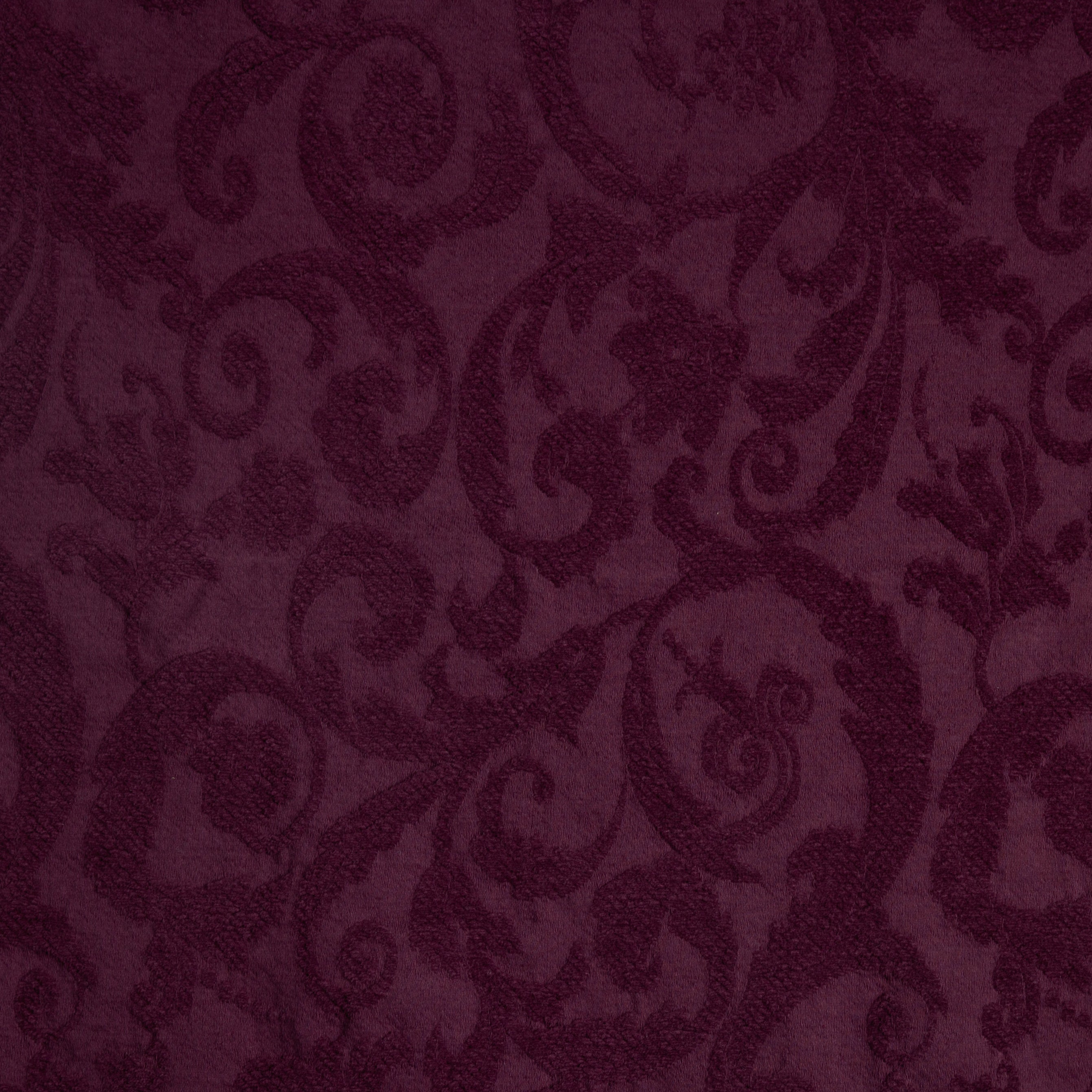 A close up of adele, a cotton damask, in fig - a saturated purple-garnet tone
