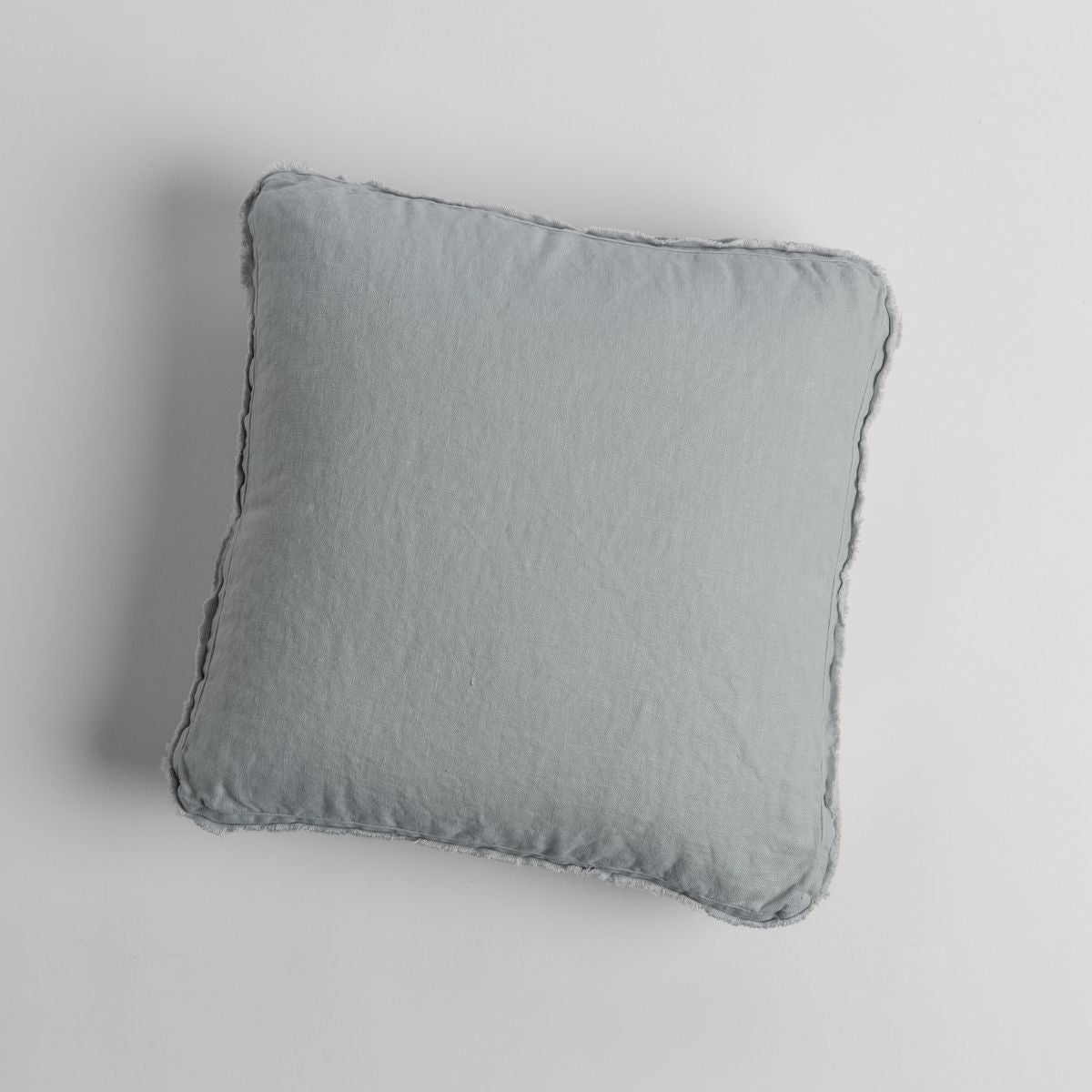 Cloud: midweight linen 18x18 inch throw pillow shot from overhead against a white background. 