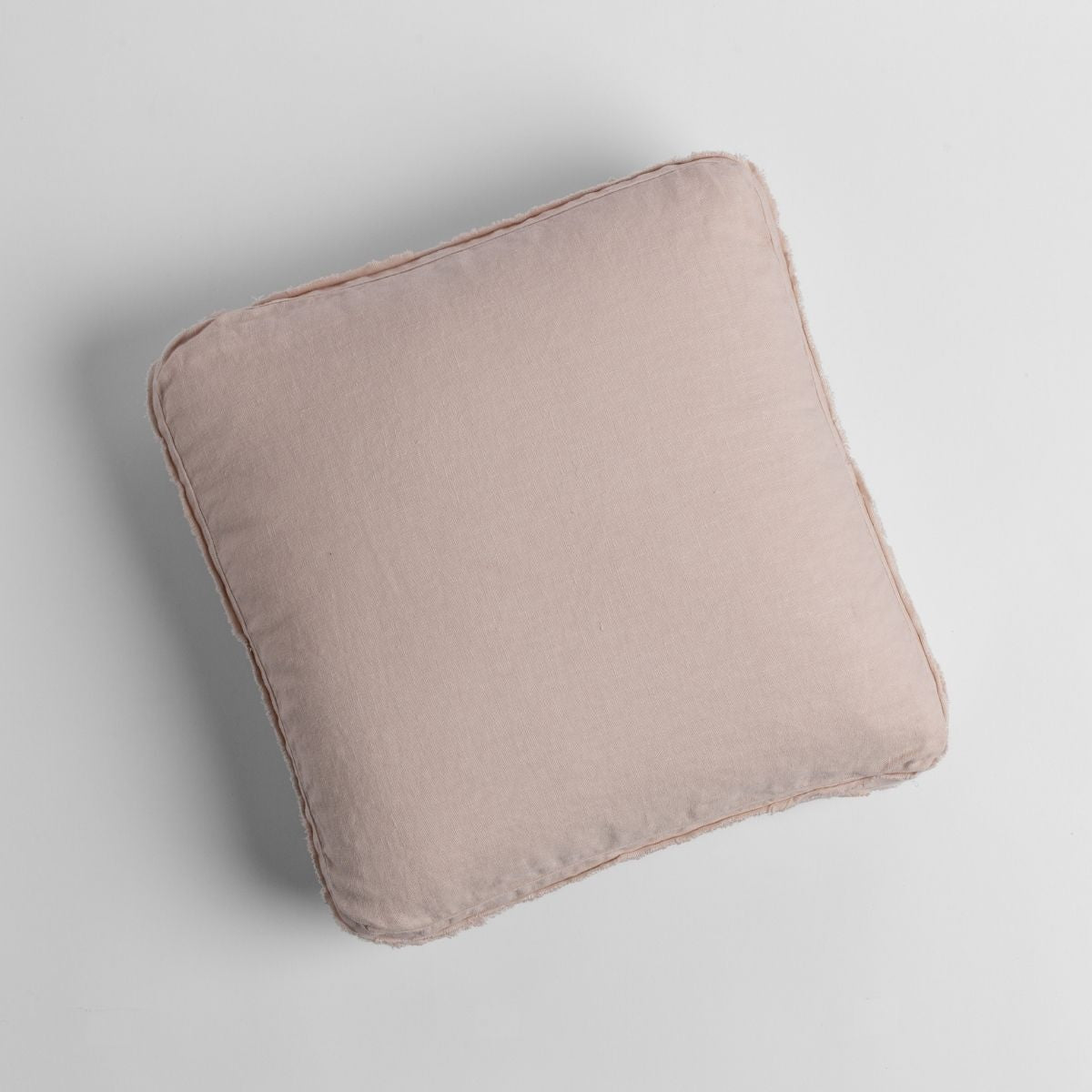 Pearl: midweight linen 18x18 inch throw pillow shot from overhead against a white background. 