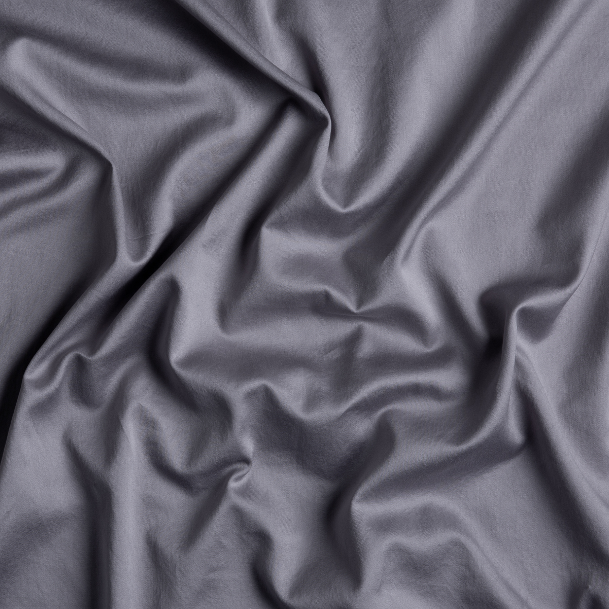French Lavender: a close up of cotton sateen fabric in french lavender, a neutral violet tone.
