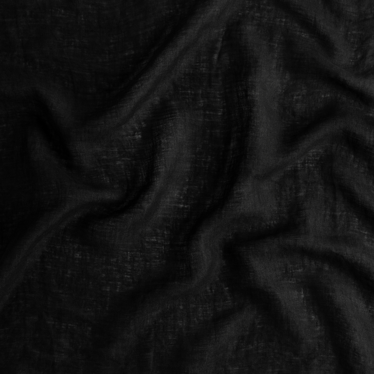 Corvino: A close up of linen whisper fabric in Corvino, a black tone