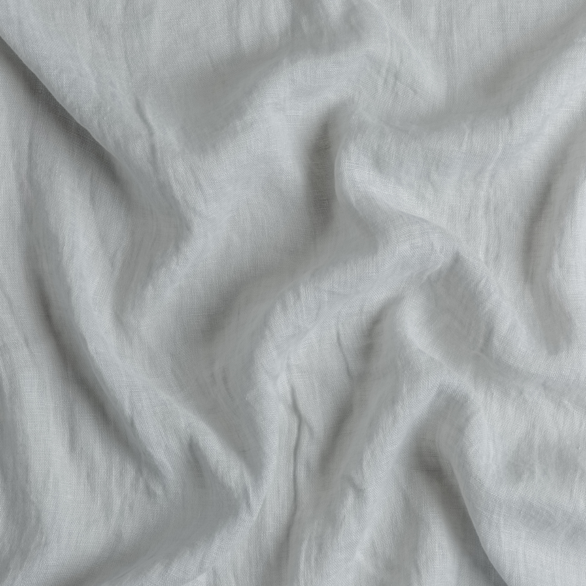Cloud: A close up of linen whisper fabric in cloud, a soft, subtle sky blue-grey.