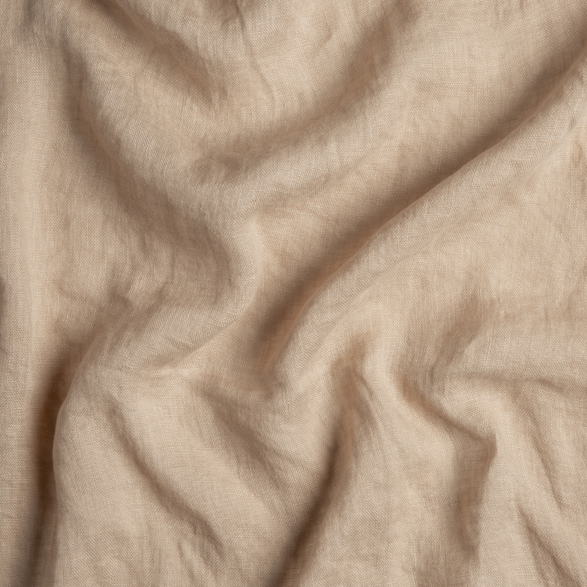 Honeycomb: A close up of linen whisper fabric in honeycomb, a warm golden tone.