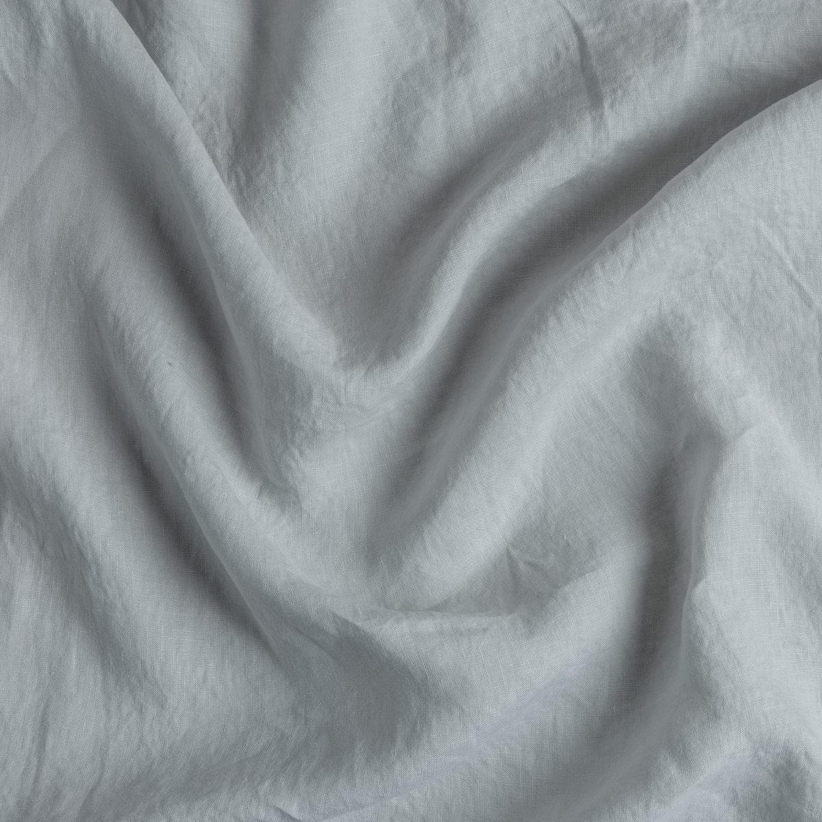 Cloud: A close up of linen fabric in cloud, a soft, subtle sky blue-grey.