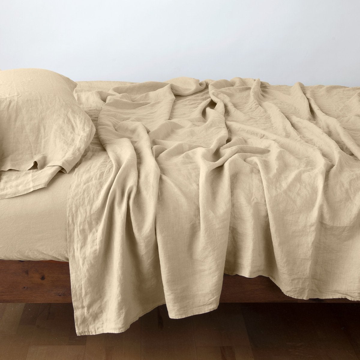 Honeycomb: sleeping pillow with matching rumpled sheeting - side view.