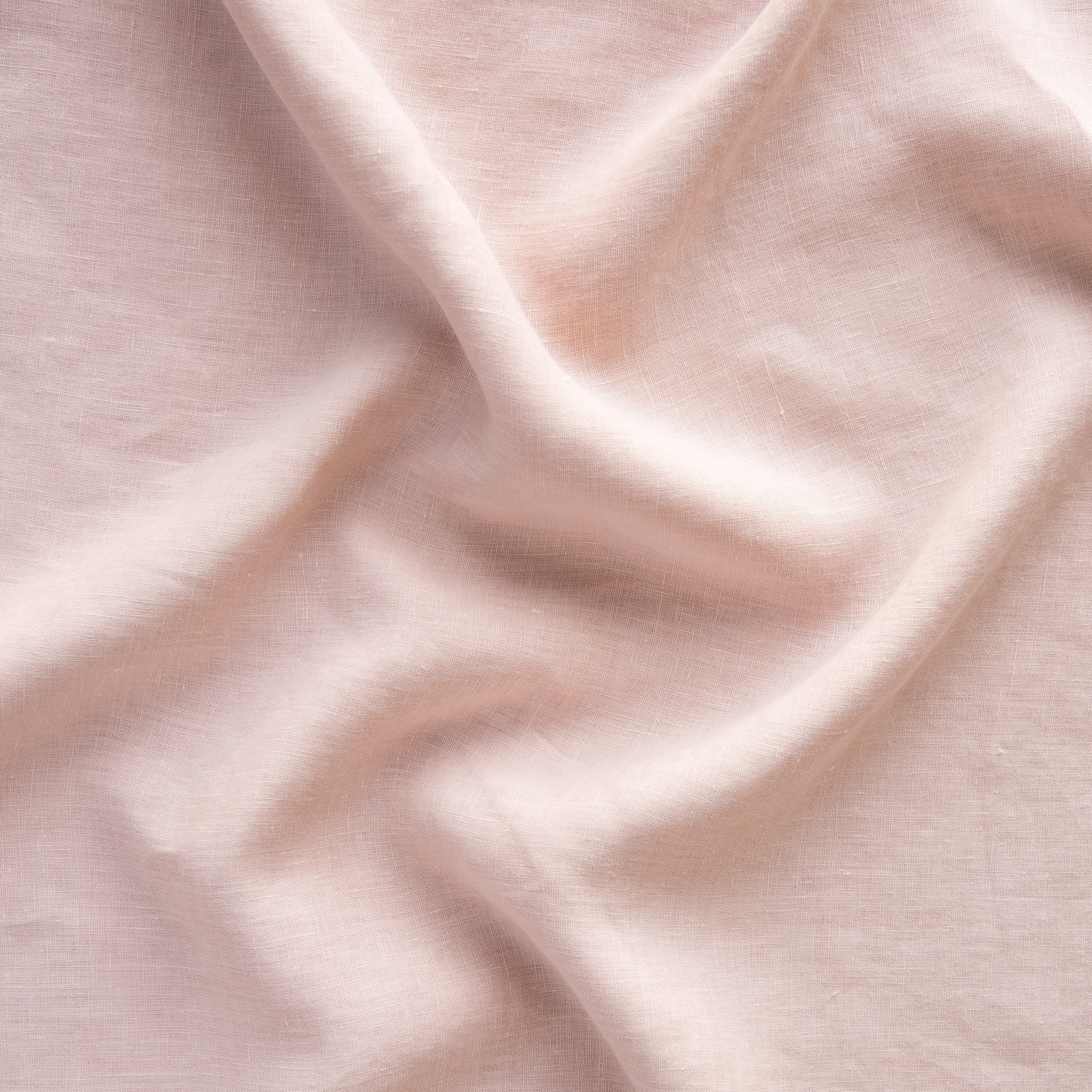 Rouge: A close up of linen in rouge, a mid-tone blush pink.