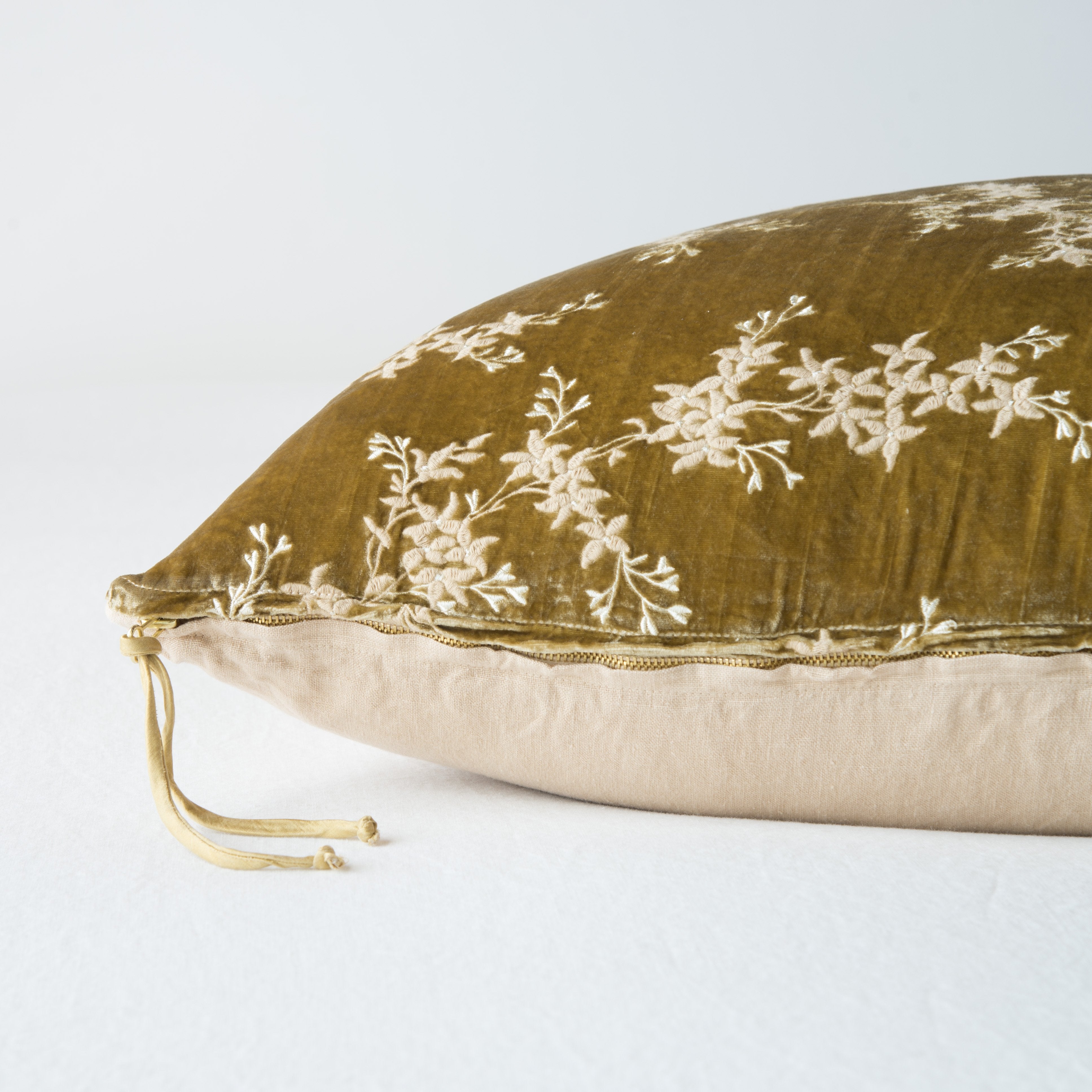 Honeycomb: Close-up side vew featuring brass zipper with charmeuse pull, and linen back.