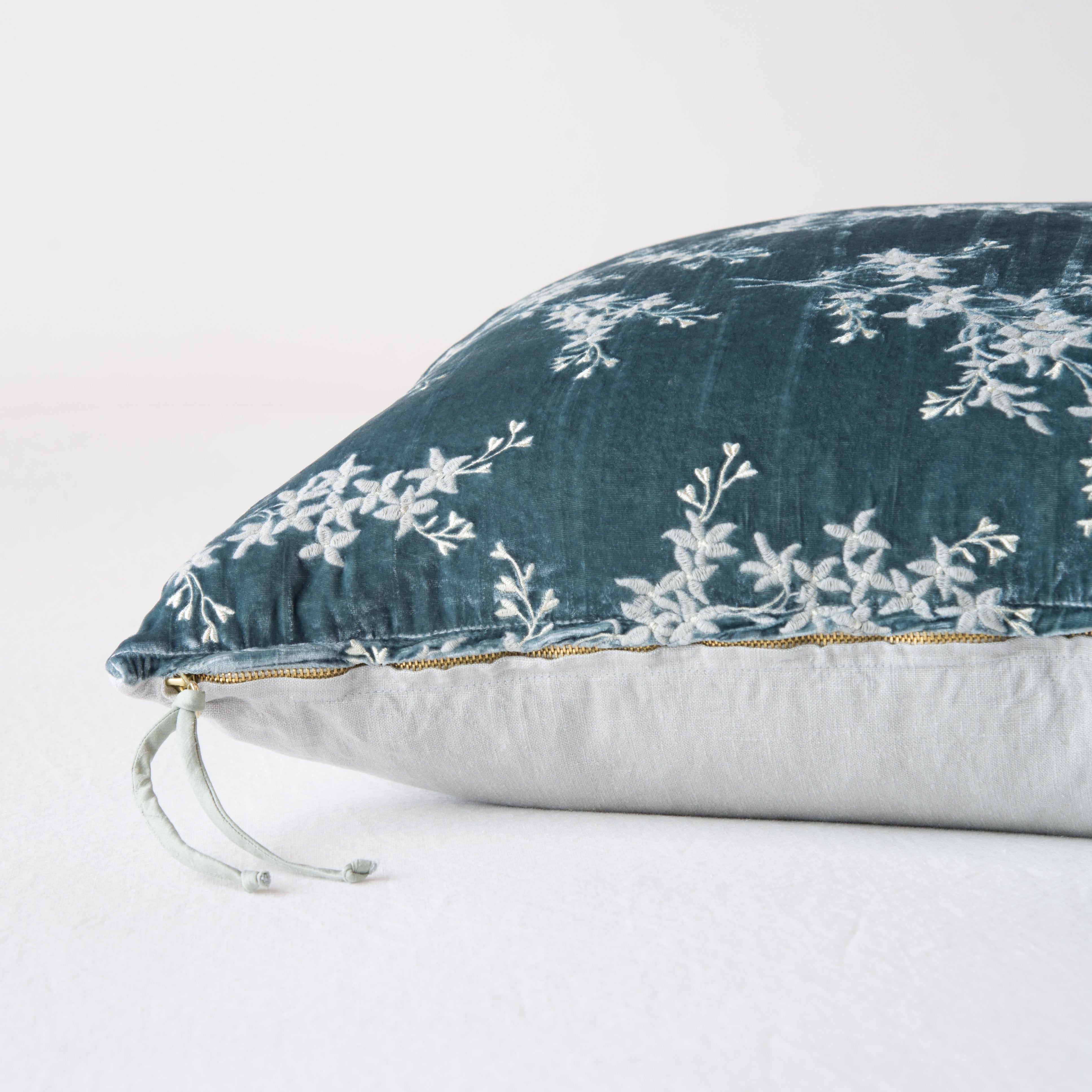 Mineral: Close-up side vew featuring brass zipper with charmeuse pull, and linen back.