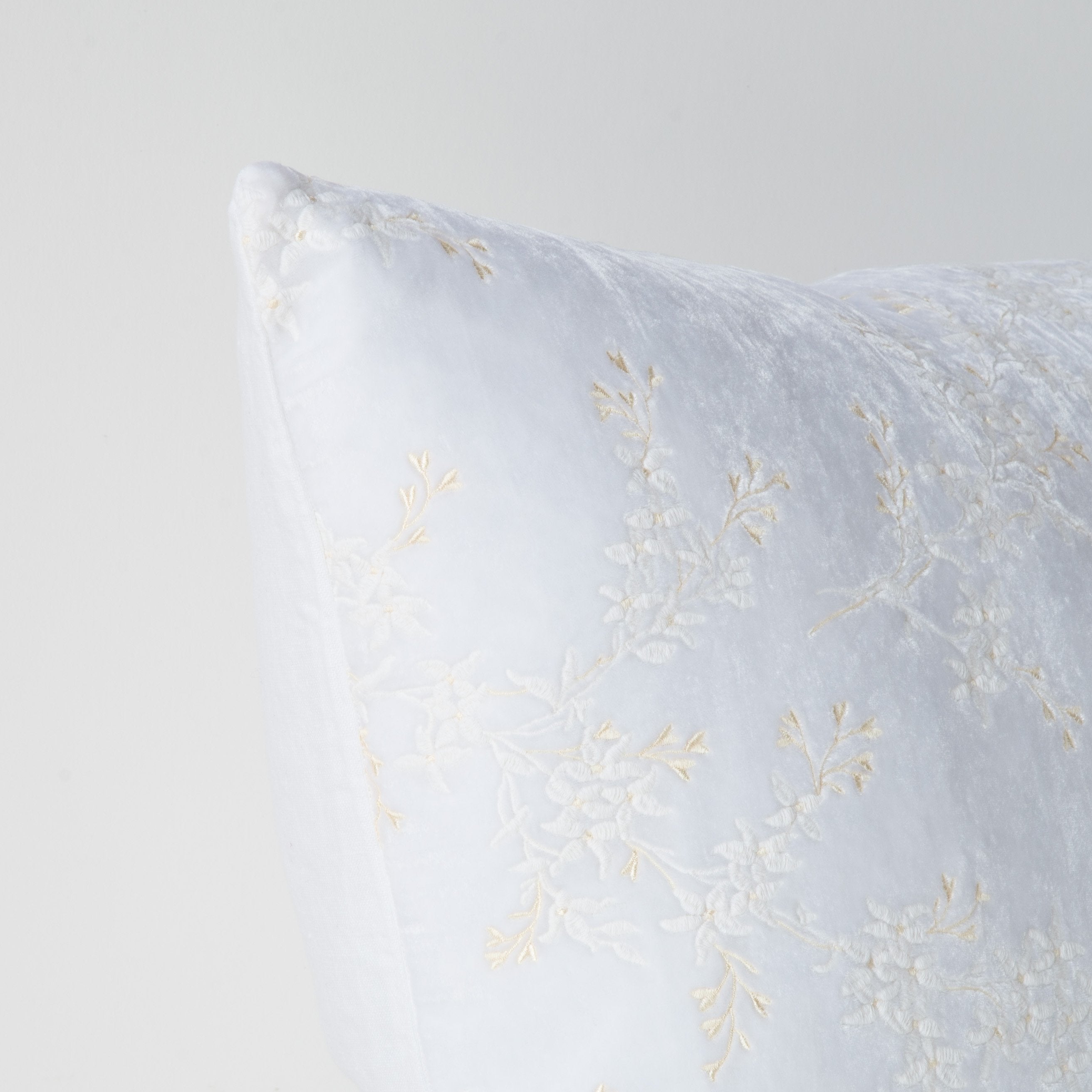 White: Corner detail close-up, highlighting two-tone embroidery and linen back.