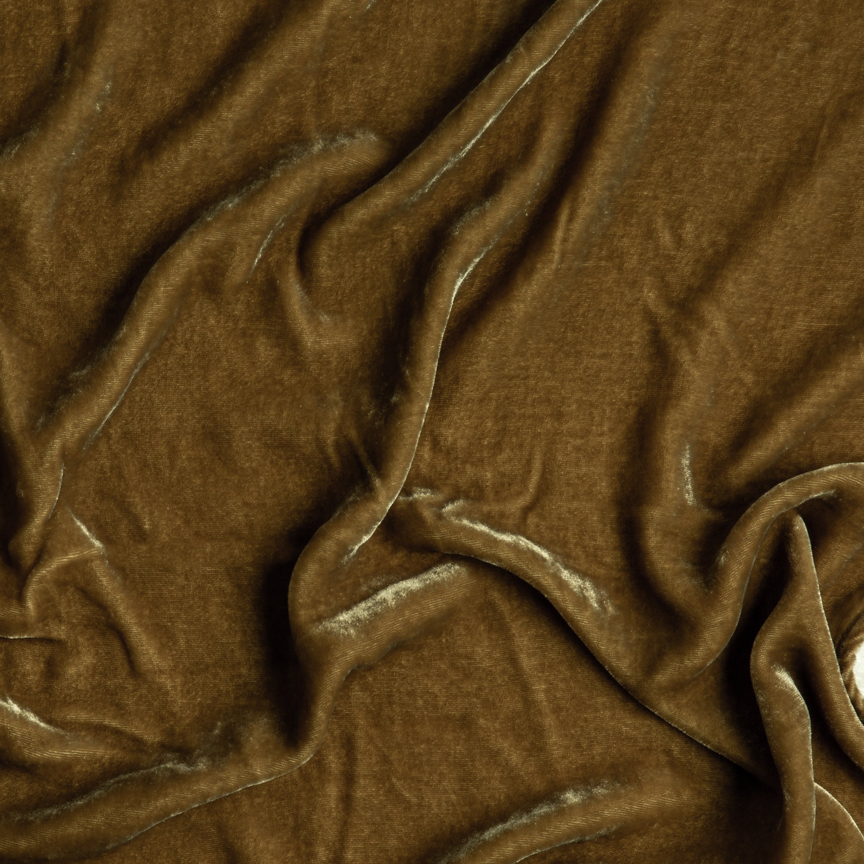 Honeycomb: A close up of silk velvet fabric in honeycomb, a warm golden tone.