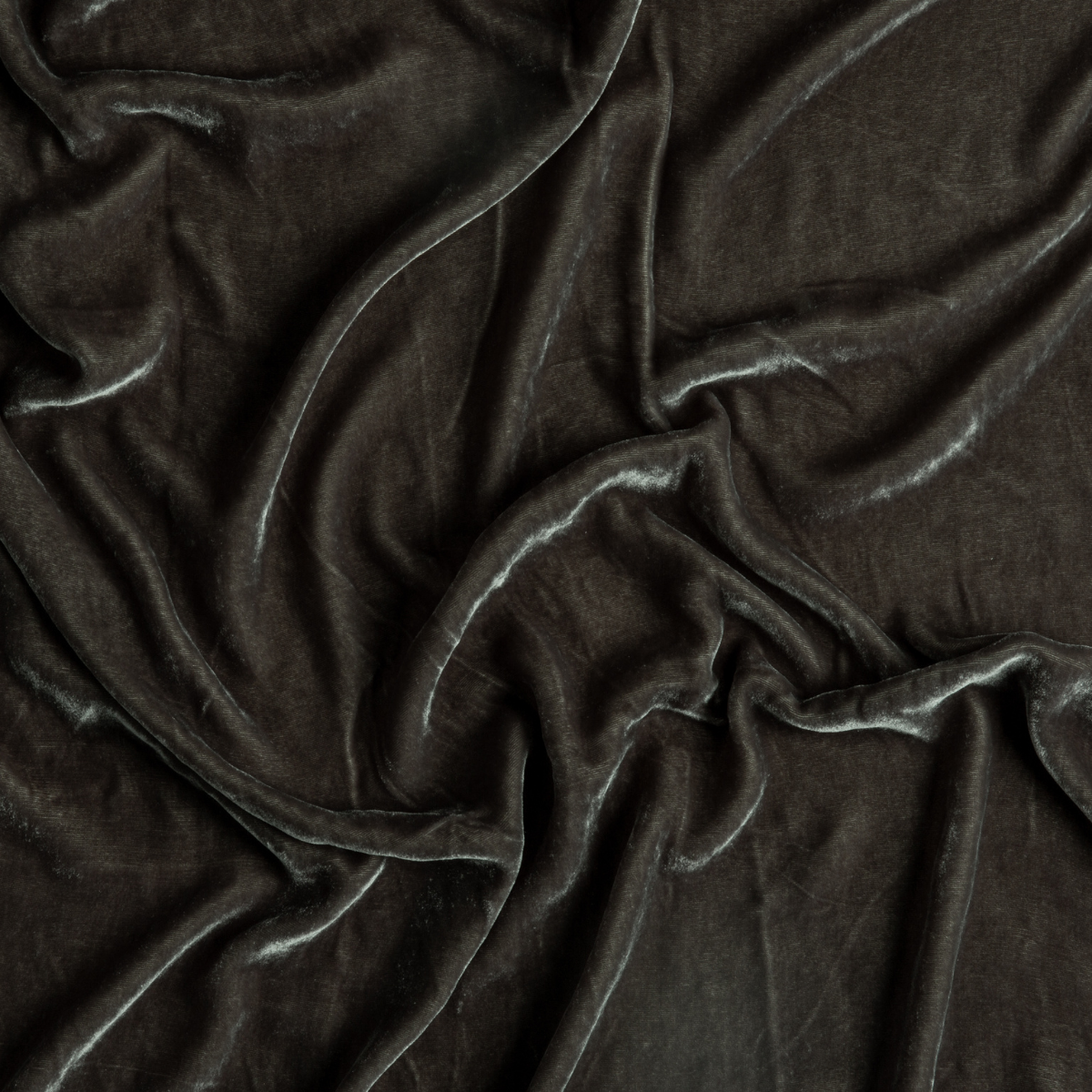Moonlight: A close up of silk velvet fabric in moonlight, a saturated, cool, mid-dark grey tone.