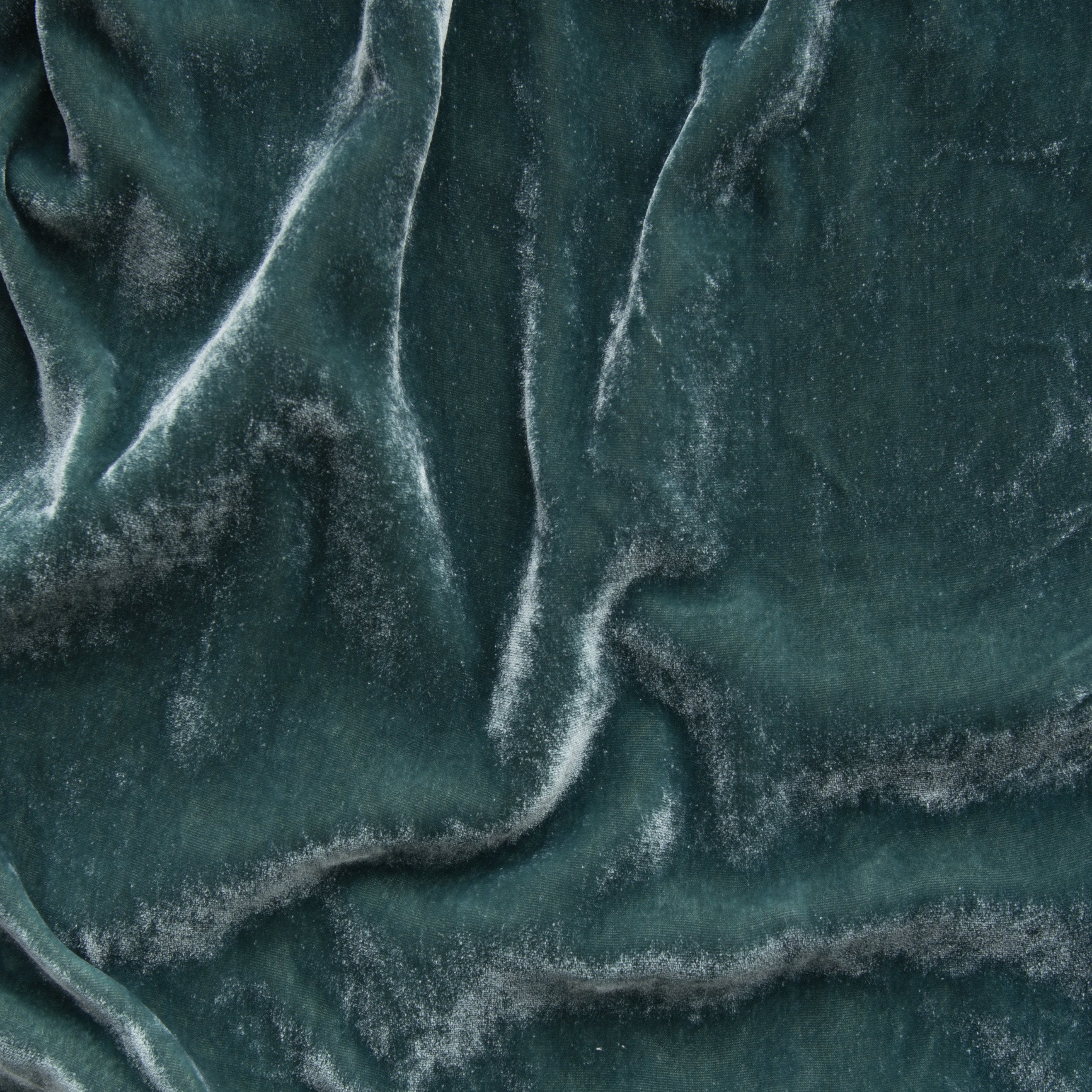 Eucalyptus: A close up of silk velvet in eucalyptus, a soft light green. 